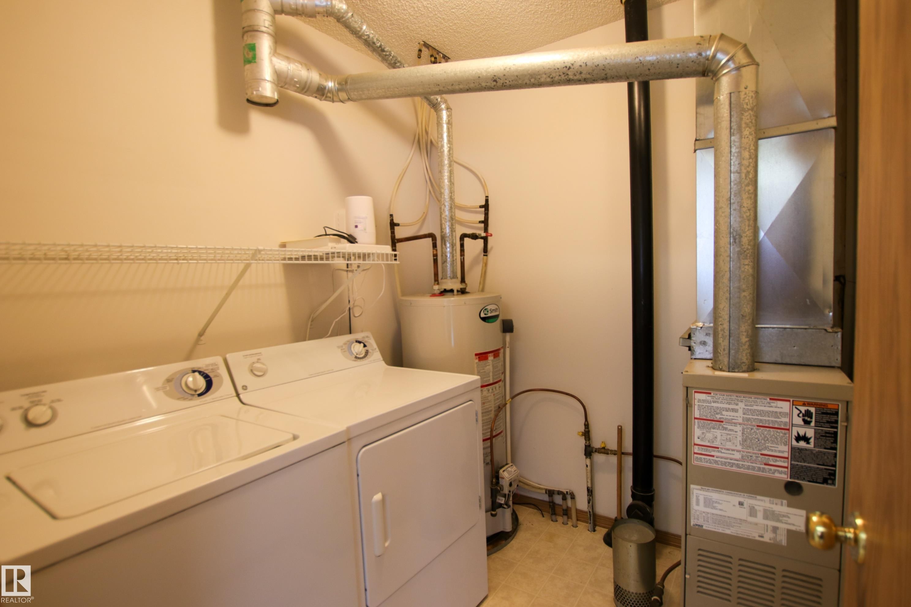 #408 610 King St, Spruce Grove, AB - Indoor Photo Showing Laundry Room