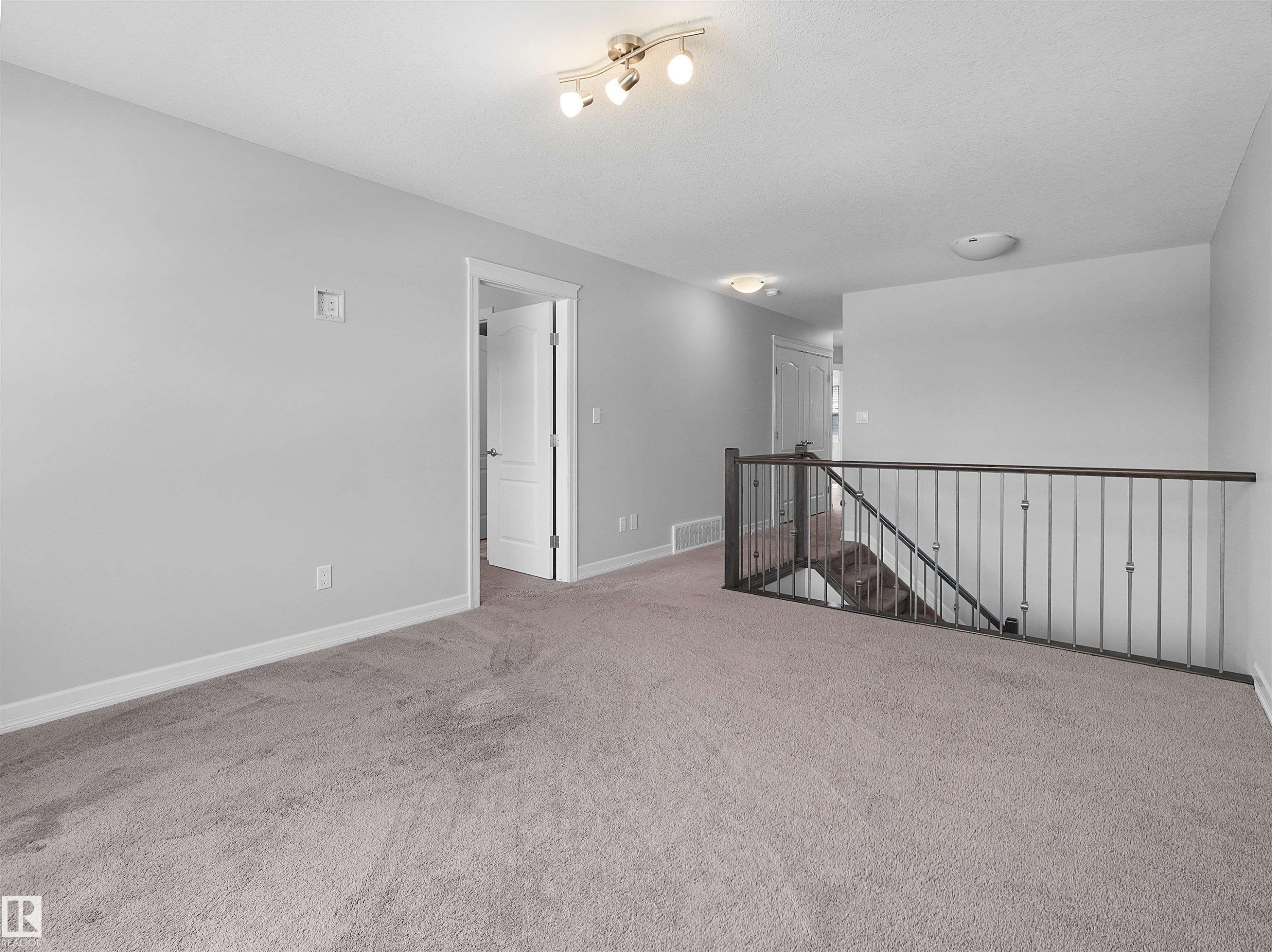 428 Simpkins Link, Leduc, AB - Indoor Photo Showing Other Room