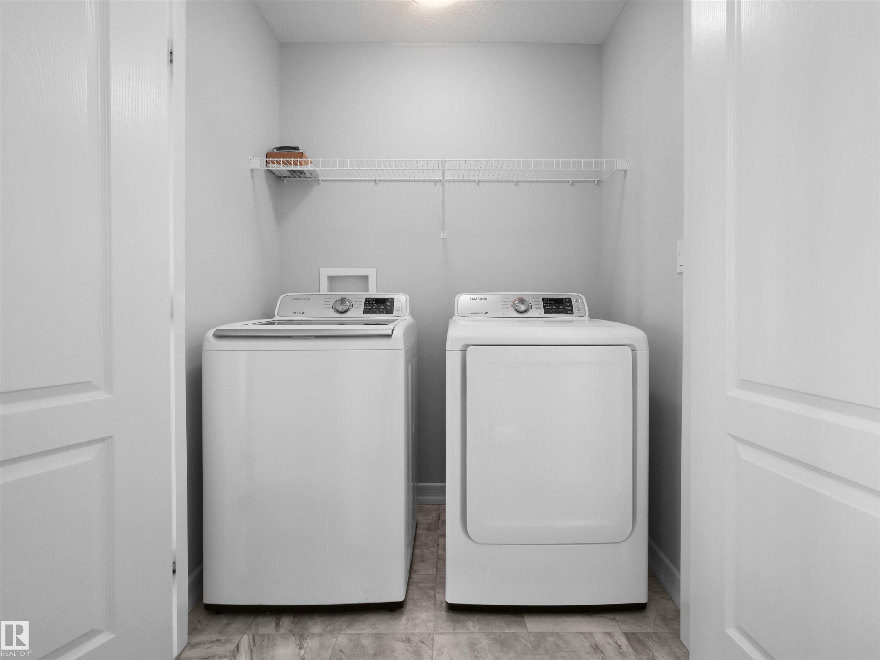 428 Simpkins Link, Leduc, AB - Indoor Photo Showing Laundry Room