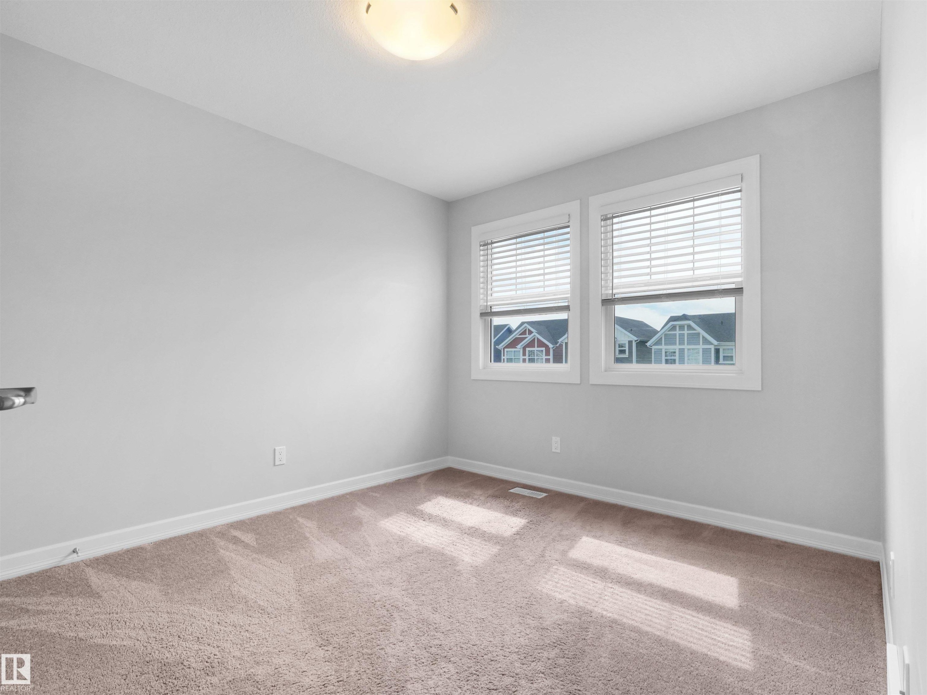 428 Simpkins Link, Leduc, AB - Indoor Photo Showing Other Room