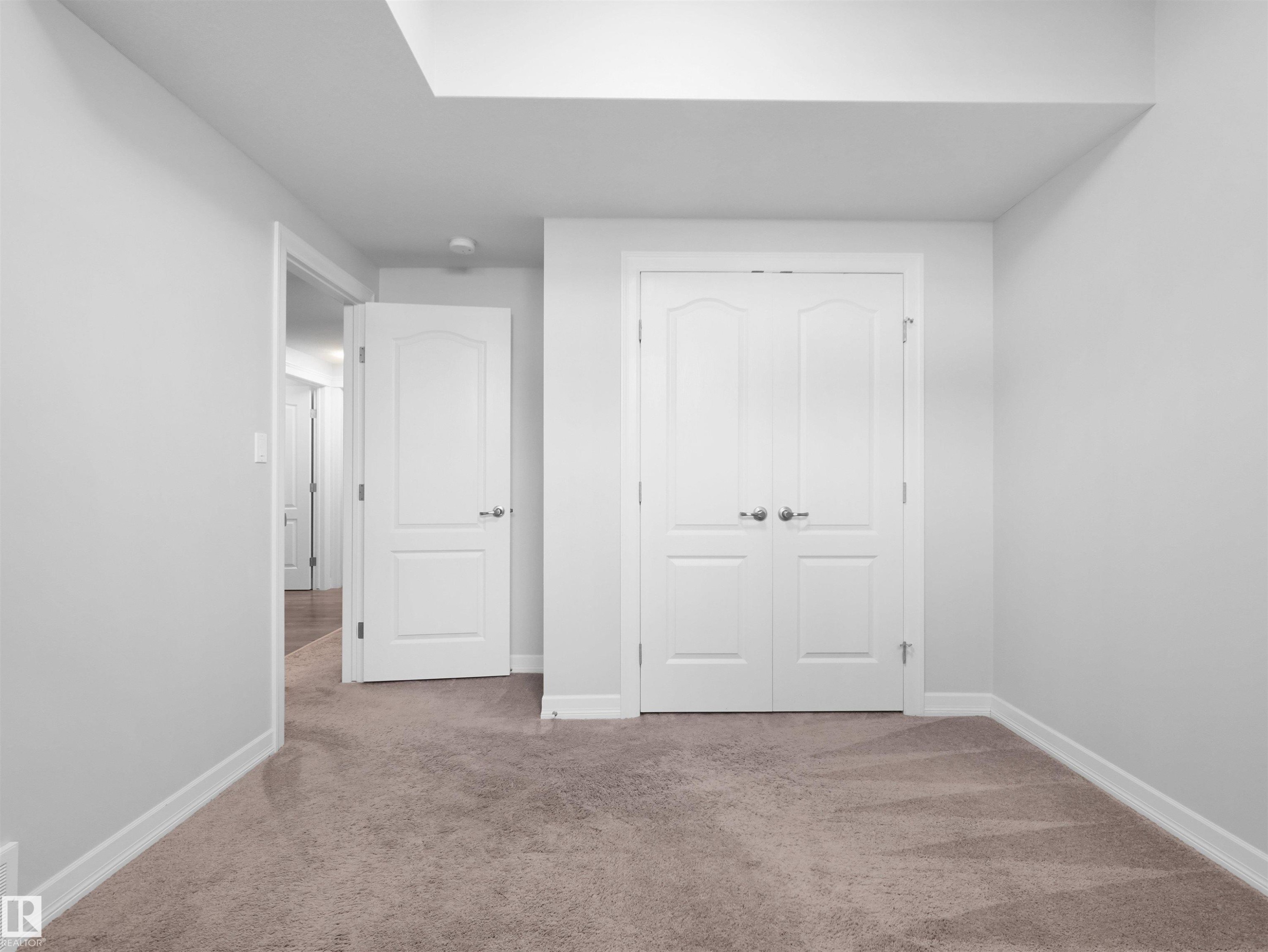 428 Simpkins Link, Leduc, AB - Indoor Photo Showing Other Room