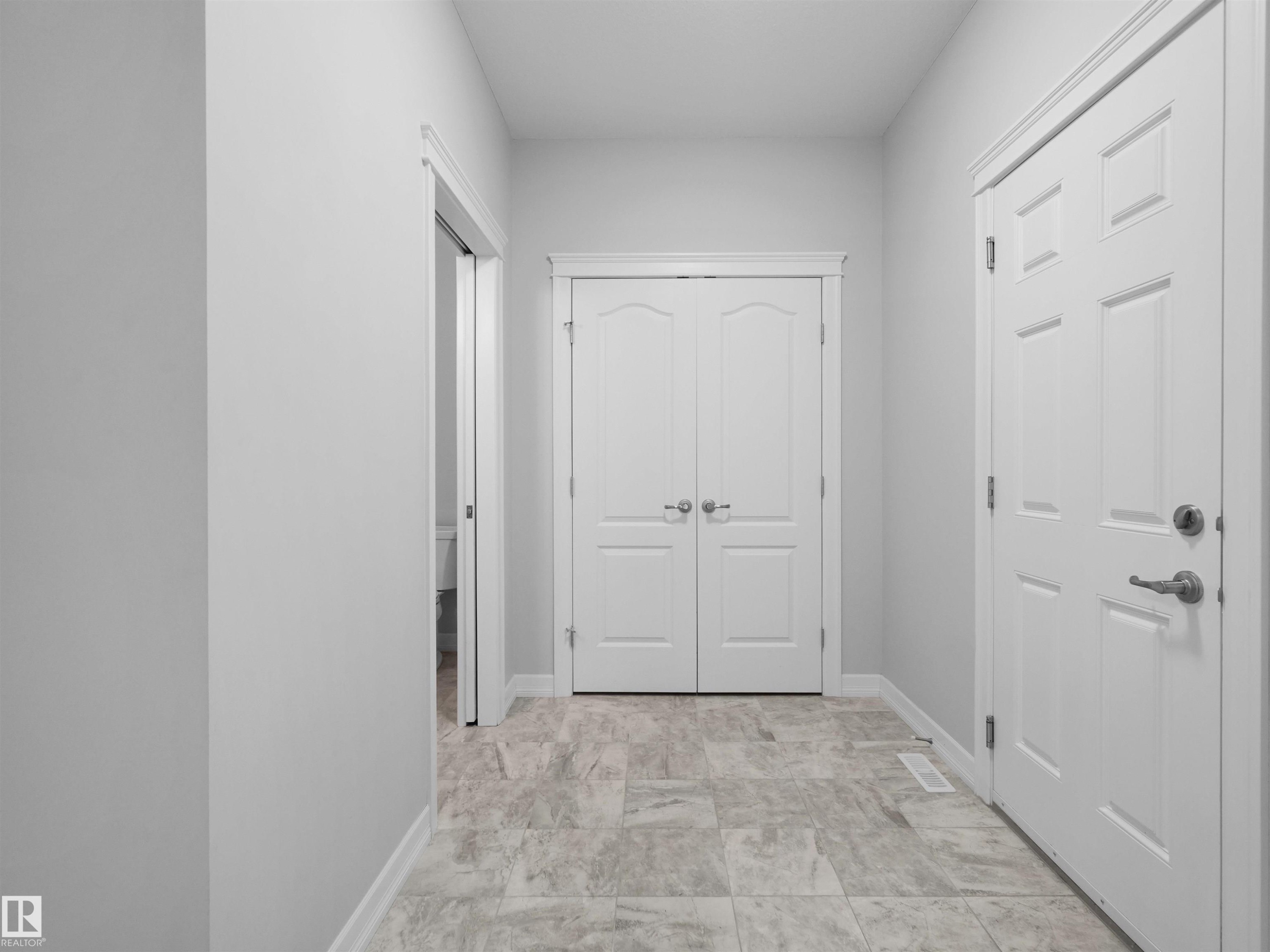 428 Simpkins Link, Leduc, AB - Indoor Photo Showing Other Room