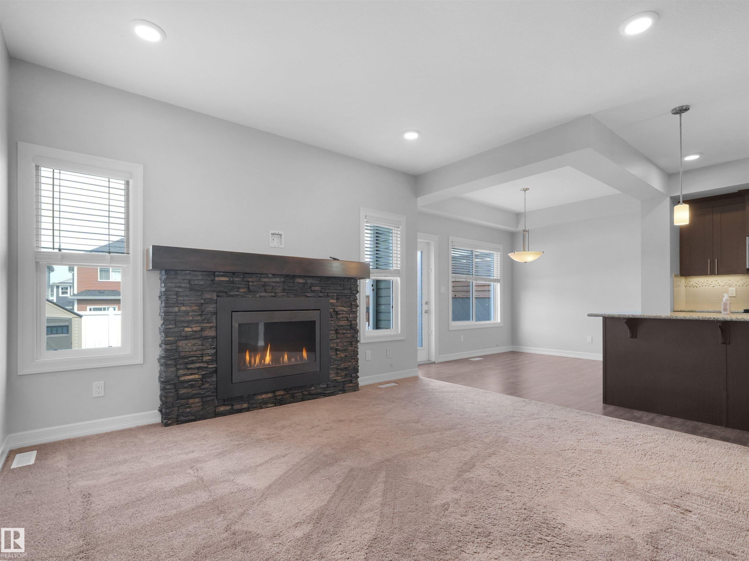 428 Simpkins Link, Leduc, AB - Indoor Photo Showing Living Room With Fireplace