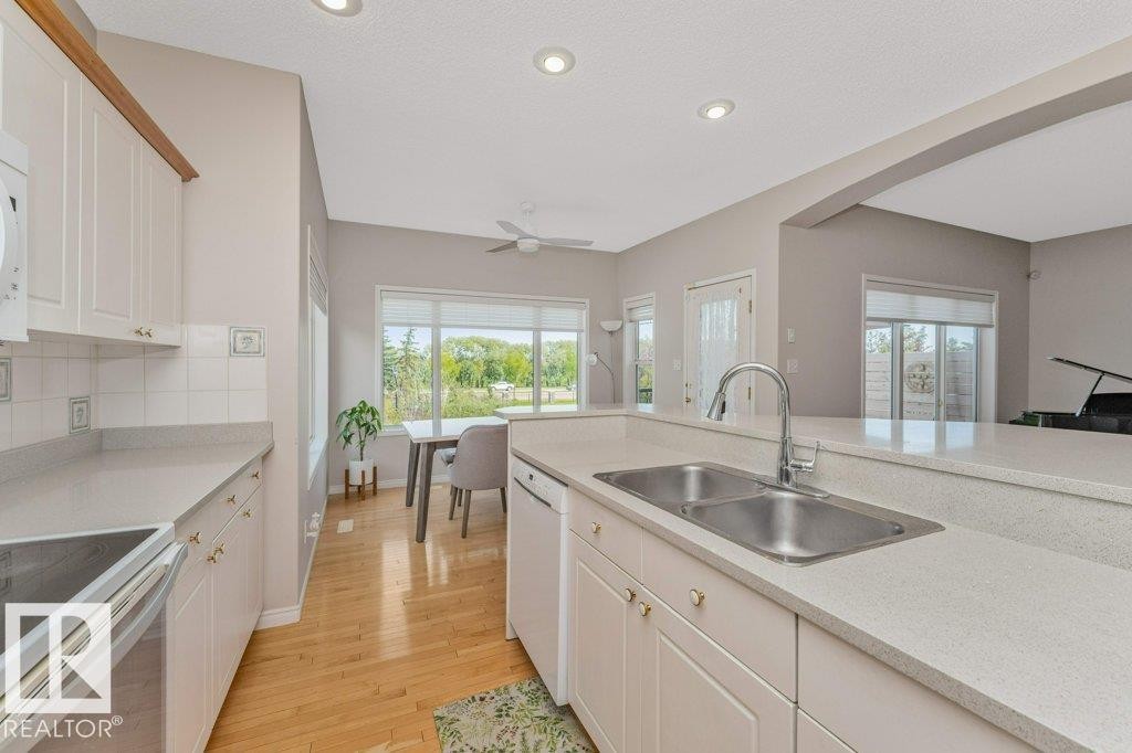 1072 Barnes Way Sw, Edmonton, AB - Indoor Photo Showing Kitchen With Double Sink
