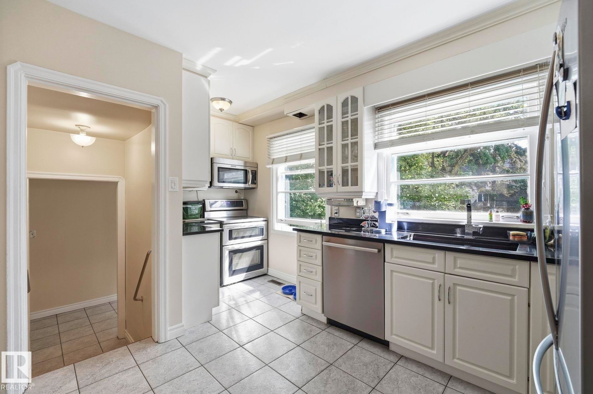 9107 118 Street Nw, Edmonton, AB - Indoor Photo Showing Kitchen With Double Sink
