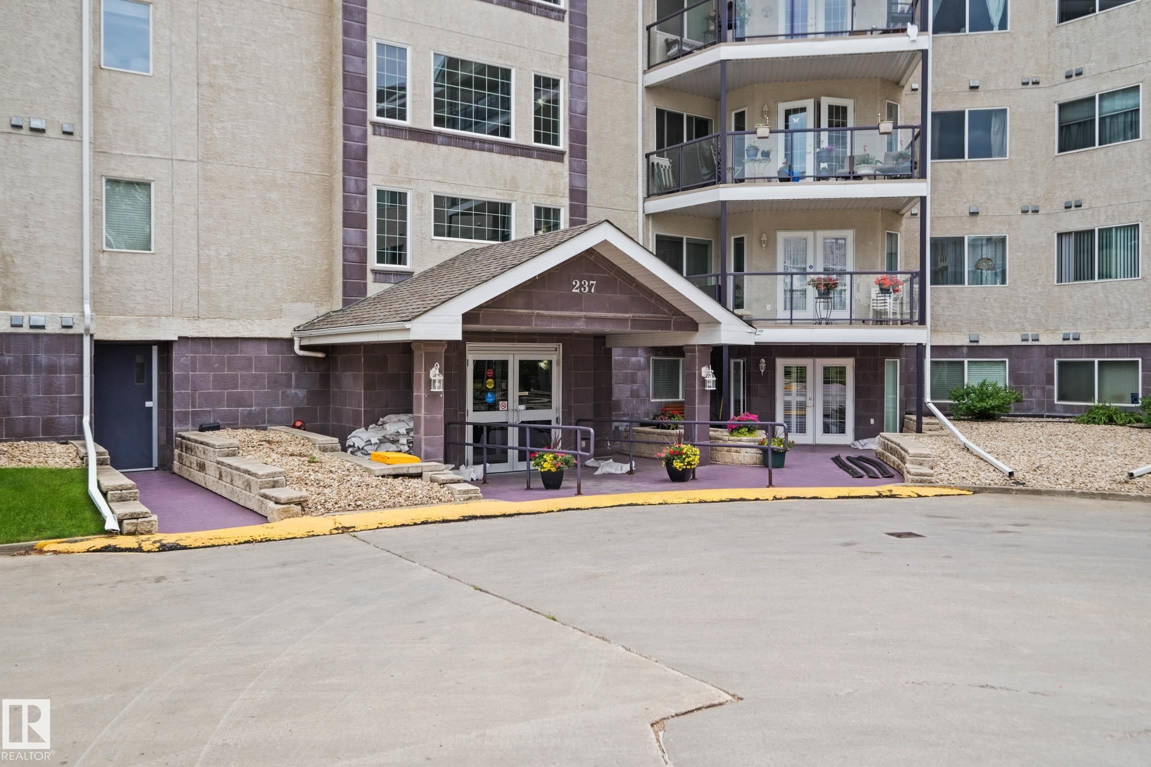 #209 237 Youville Dr E Nw, Edmonton, AB - Outdoor With Balcony With Facade