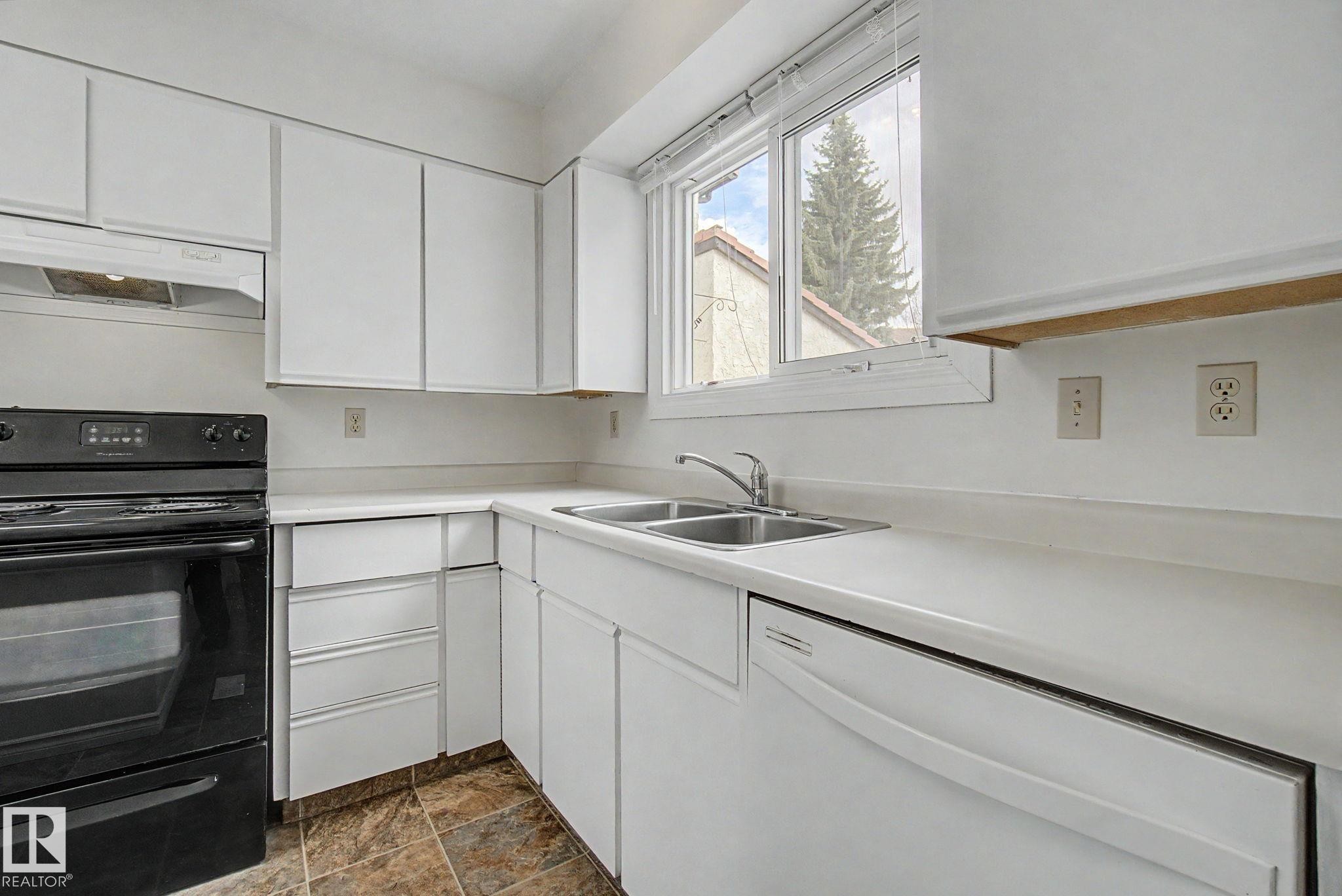 2932 36 Street Nw, Edmonton, AB - Indoor Photo Showing Kitchen With Double Sink