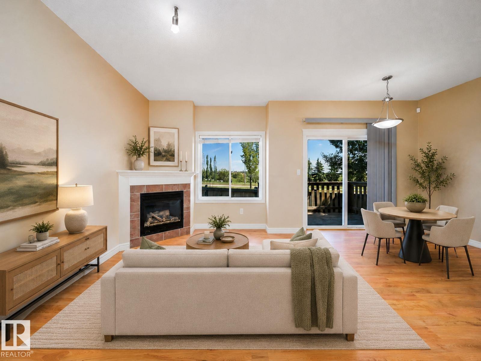 #46 15151 43 St Nw, Edmonton, AB - Indoor Photo Showing Living Room With Fireplace