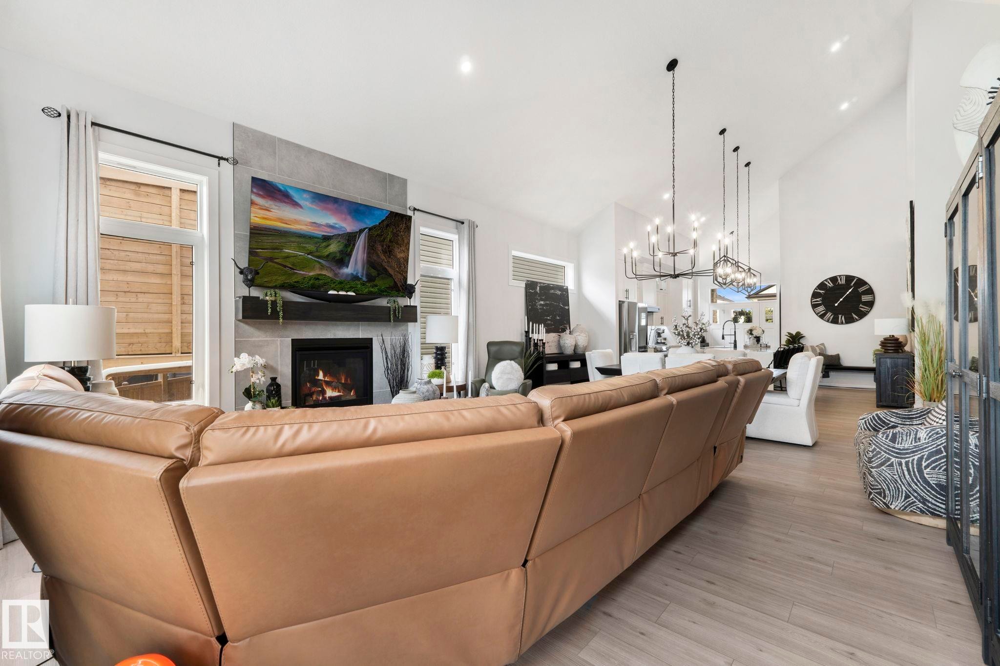 55 Maple Crescent, Gibbons, AB - Indoor Photo Showing Living Room With Fireplace