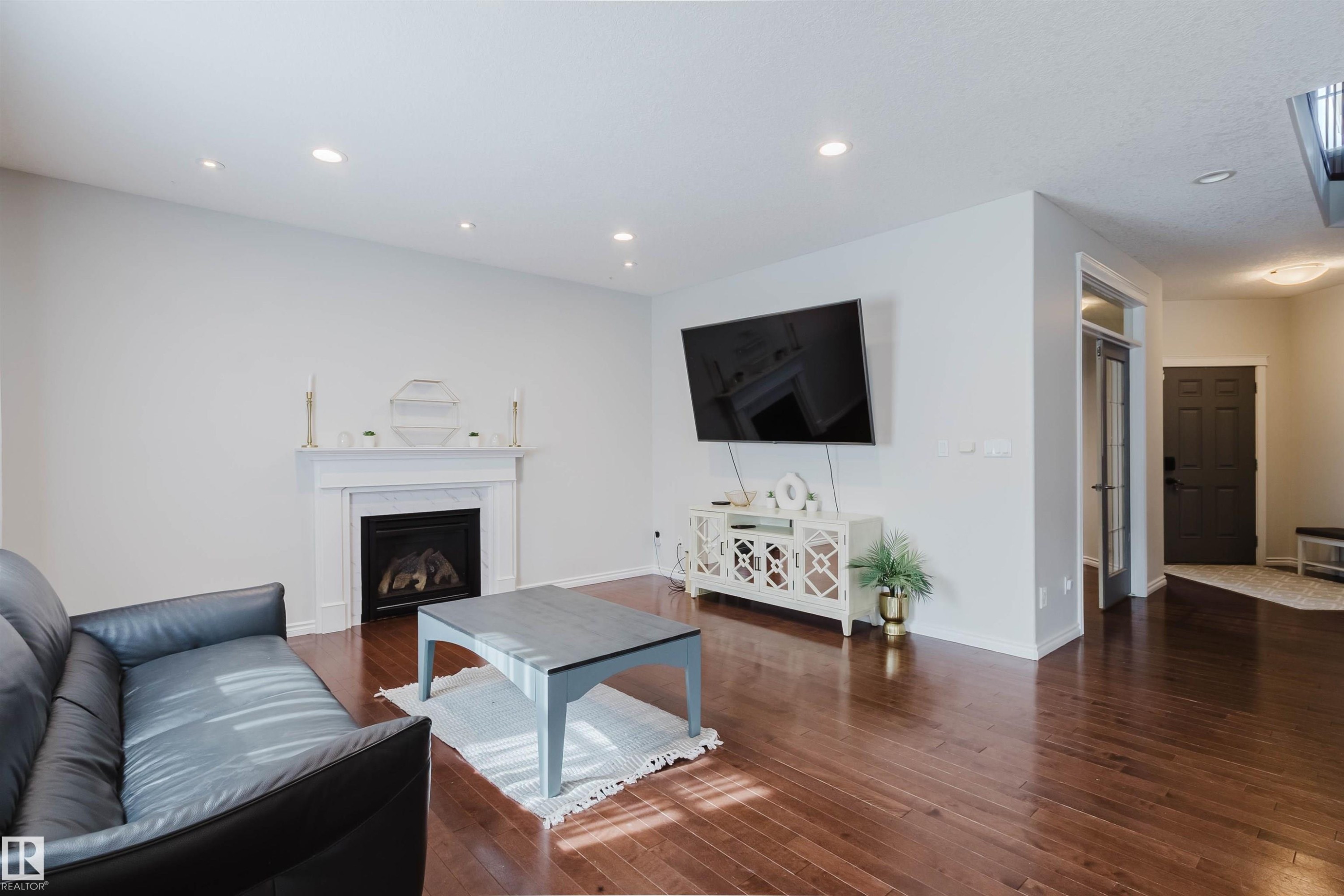 5623 206 Street Nw, Edmonton, AB - Indoor Photo Showing Living Room With Fireplace