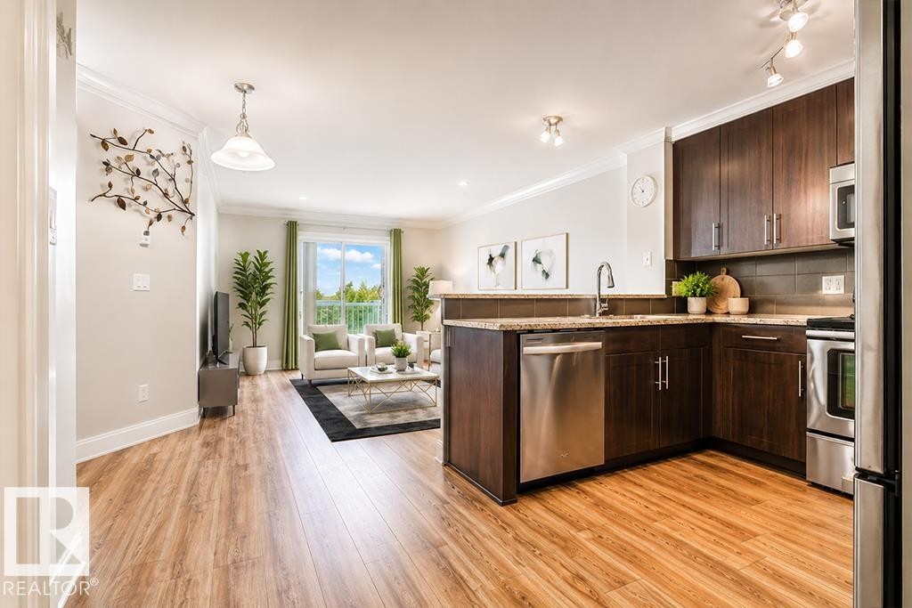 #411 2204 44 Av Nw, Edmonton, AB - Indoor Photo Showing Kitchen With Stainless Steel Kitchen