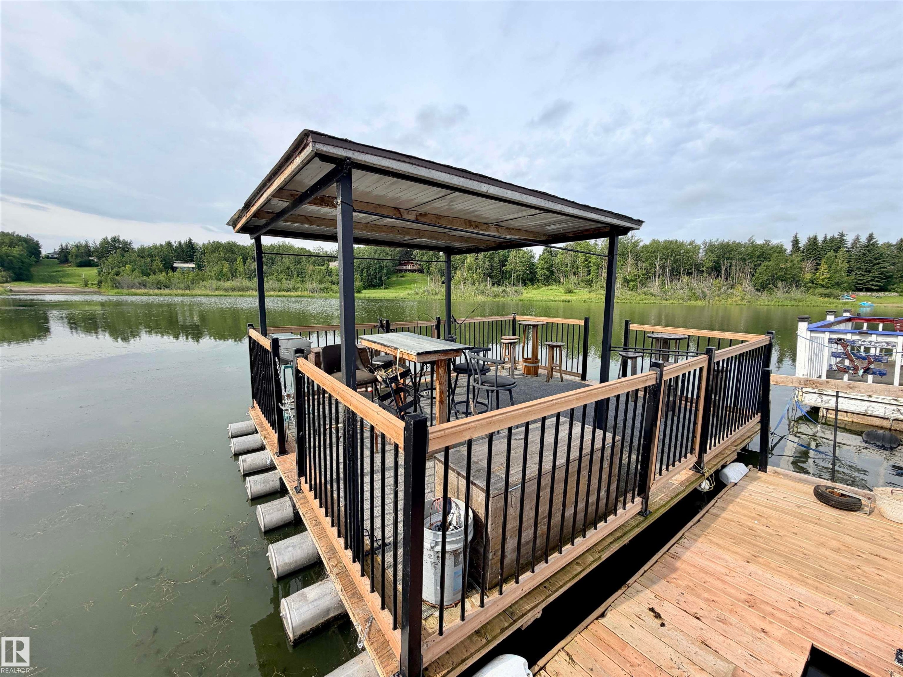 627 59201 Rr 95, Rural St. Paul County, AB - Outdoor With Body Of Water With Deck Patio Veranda With Exterior