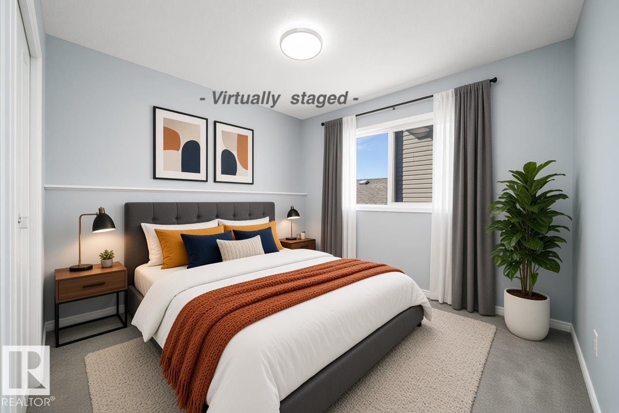 Recessed window with drapes, wall-to-wall carpeting, and a flush mount ceiling light - 7848 7 Avenue Sw, Edmonton, AB