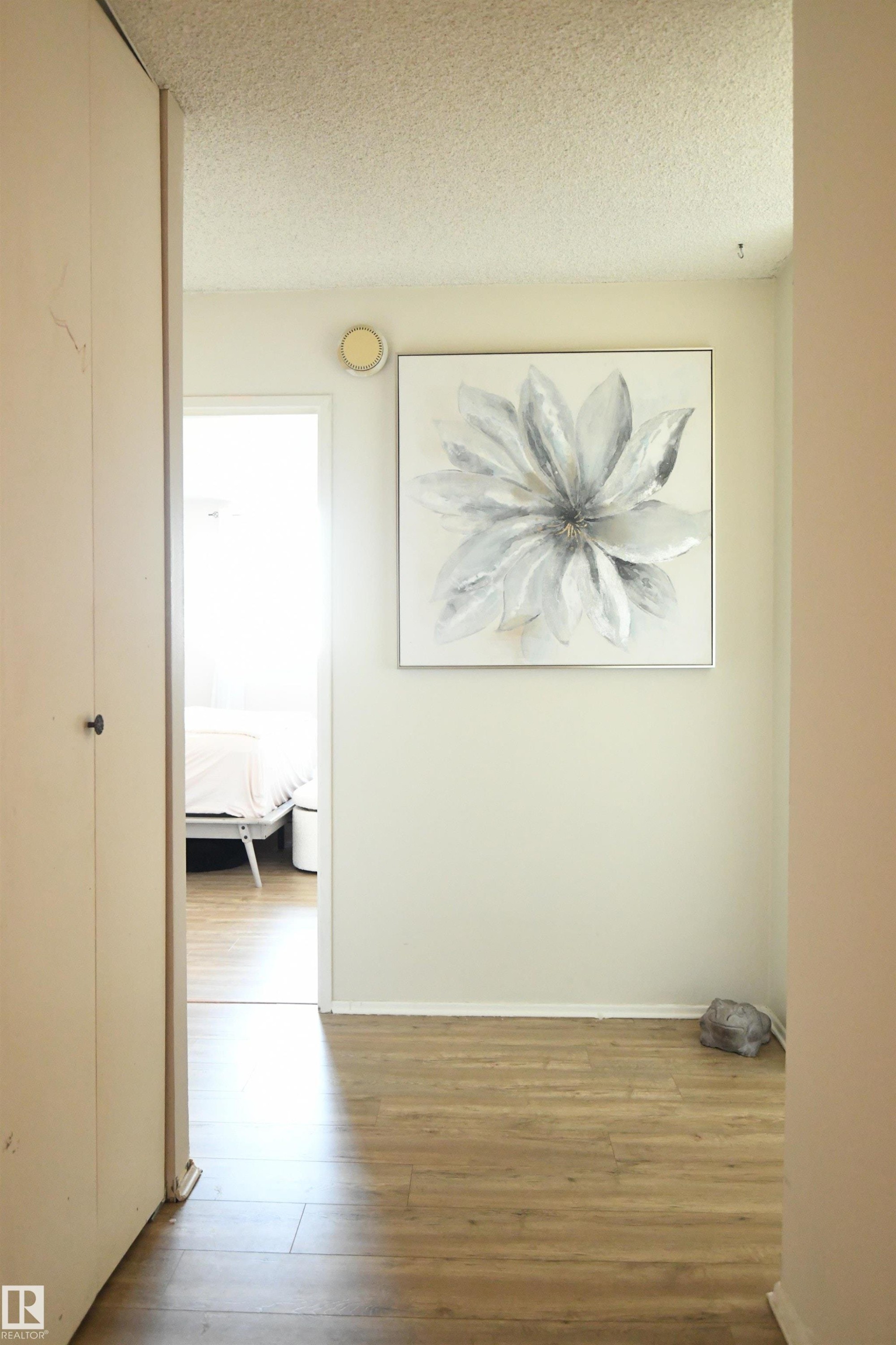The space has been fully maximized in this unit, and the hallway space provides an elegant separation from the living space, to the bedroom area - #1305 13910 Stony Plain Rd Nw, Edmonton, AB - Indoor Photo Showing Other Room