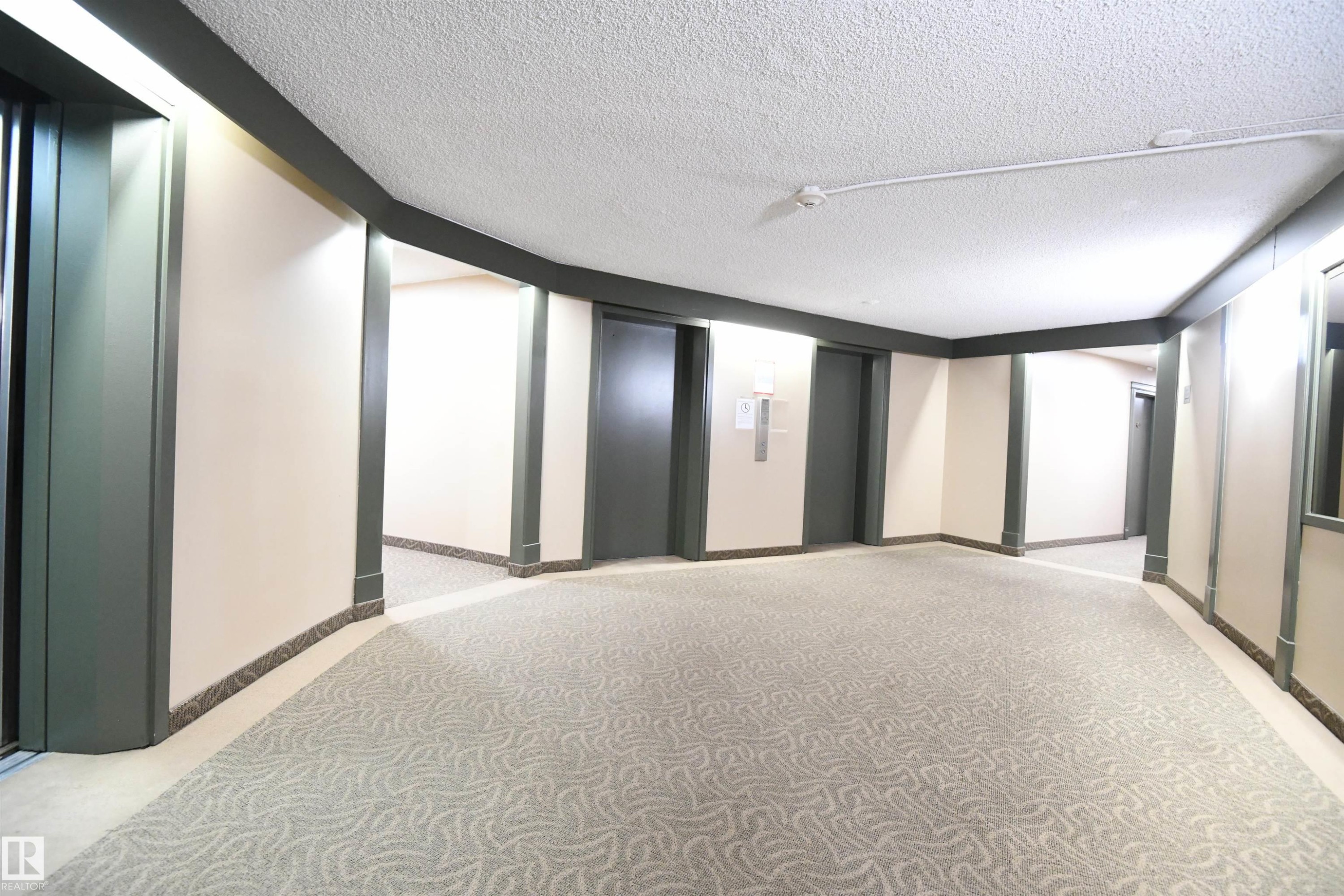 With multiple elevators, and large & open common areas, this is a very inviting building - #1305 13910 Stony Plain Rd Nw, Edmonton, AB - Indoor Photo Showing Other Room