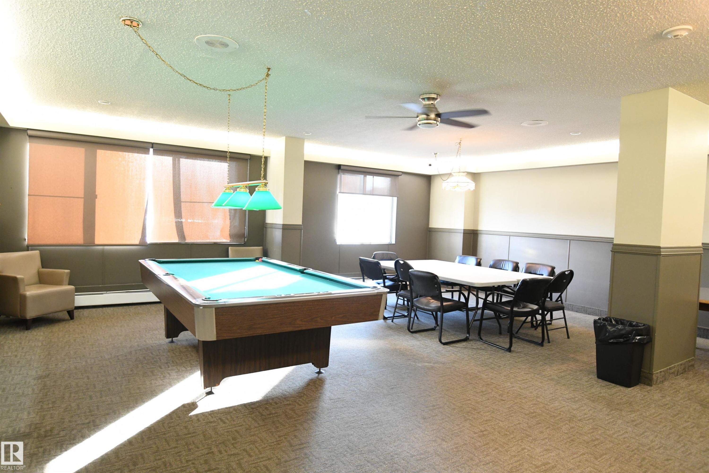 With loads of space, the social room is equipped with a pool table for residents and their guests to enjoy - #1305 13910 Stony Plain Rd Nw, Edmonton, AB - Indoor Photo Showing Other Room