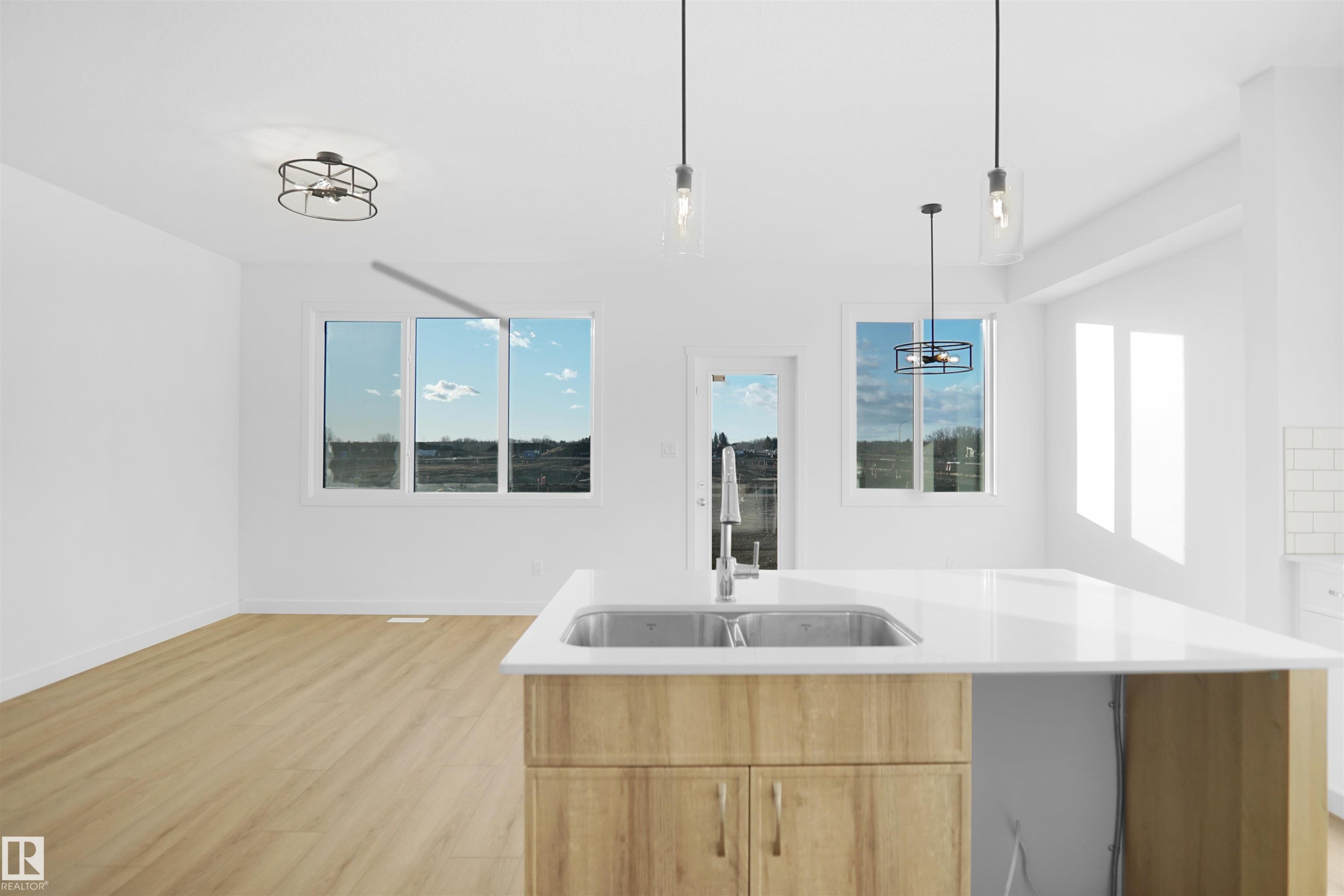 581 Ashgrove Circle, Leduc, AB - Indoor Photo Showing Kitchen With Double Sink