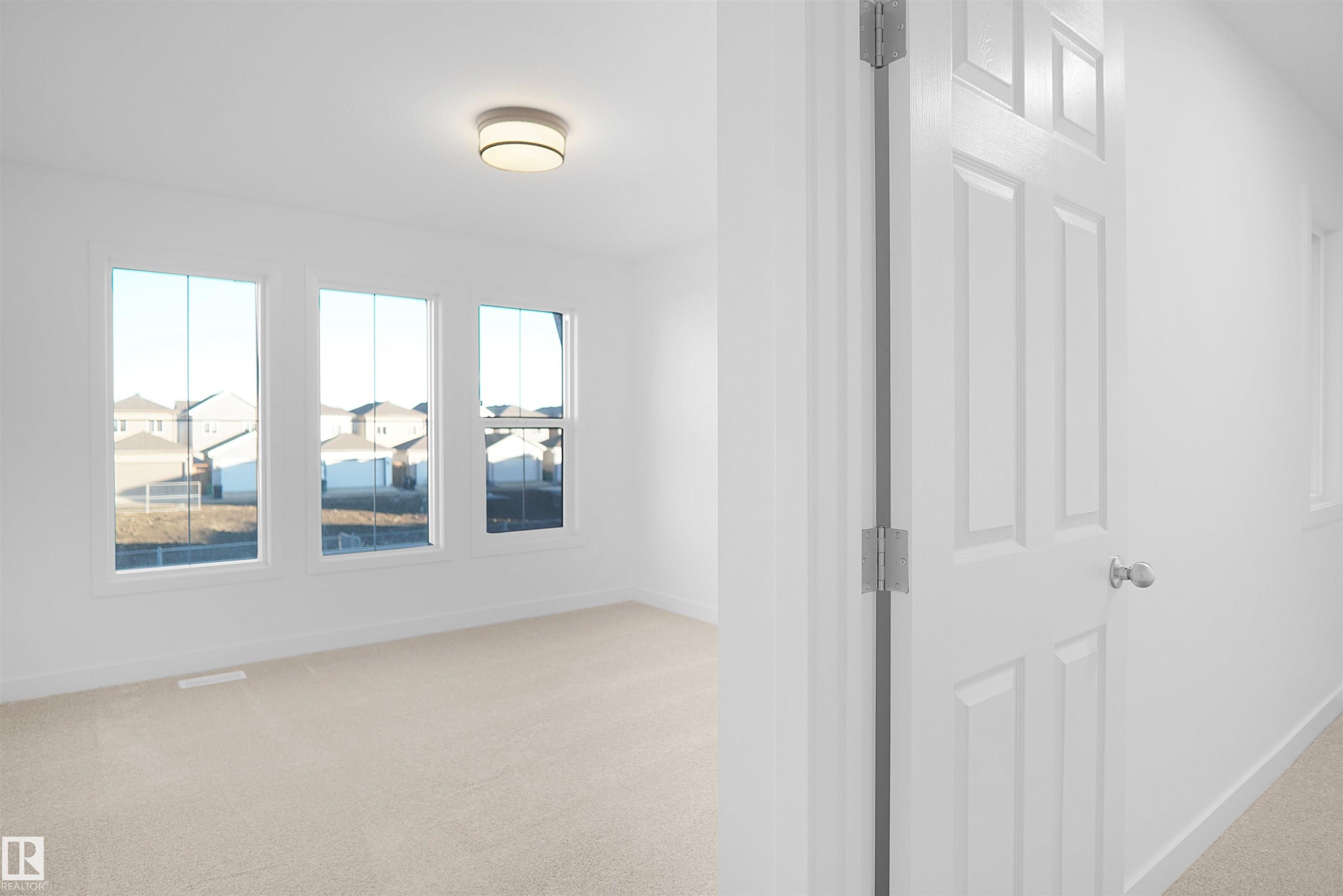 581 Ashgrove Circle, Leduc, AB - Indoor Photo Showing Other Room