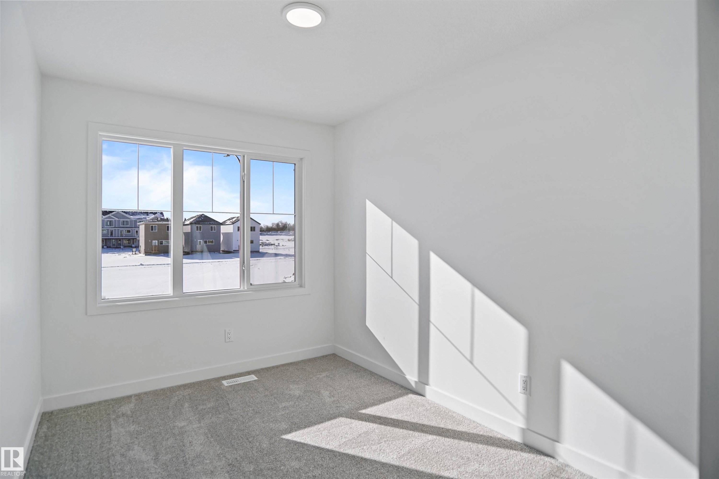 583 Ashgrove Circle, Leduc, AB - Indoor Photo Showing Other Room