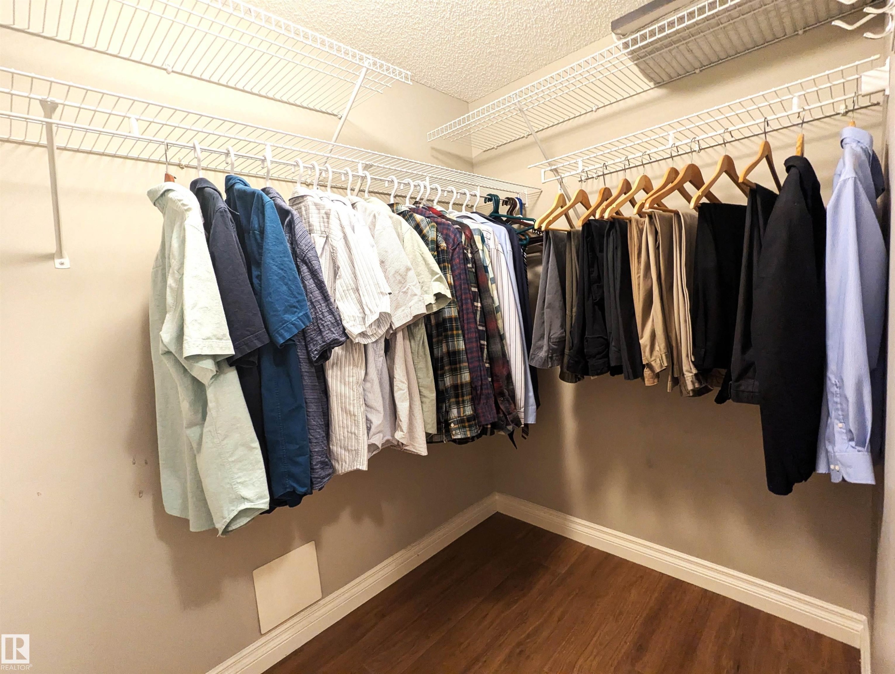 Large walk in closet. Plenty of storage space - #302 9811 96A St Nw, Edmonton, AB - Indoor With Storage