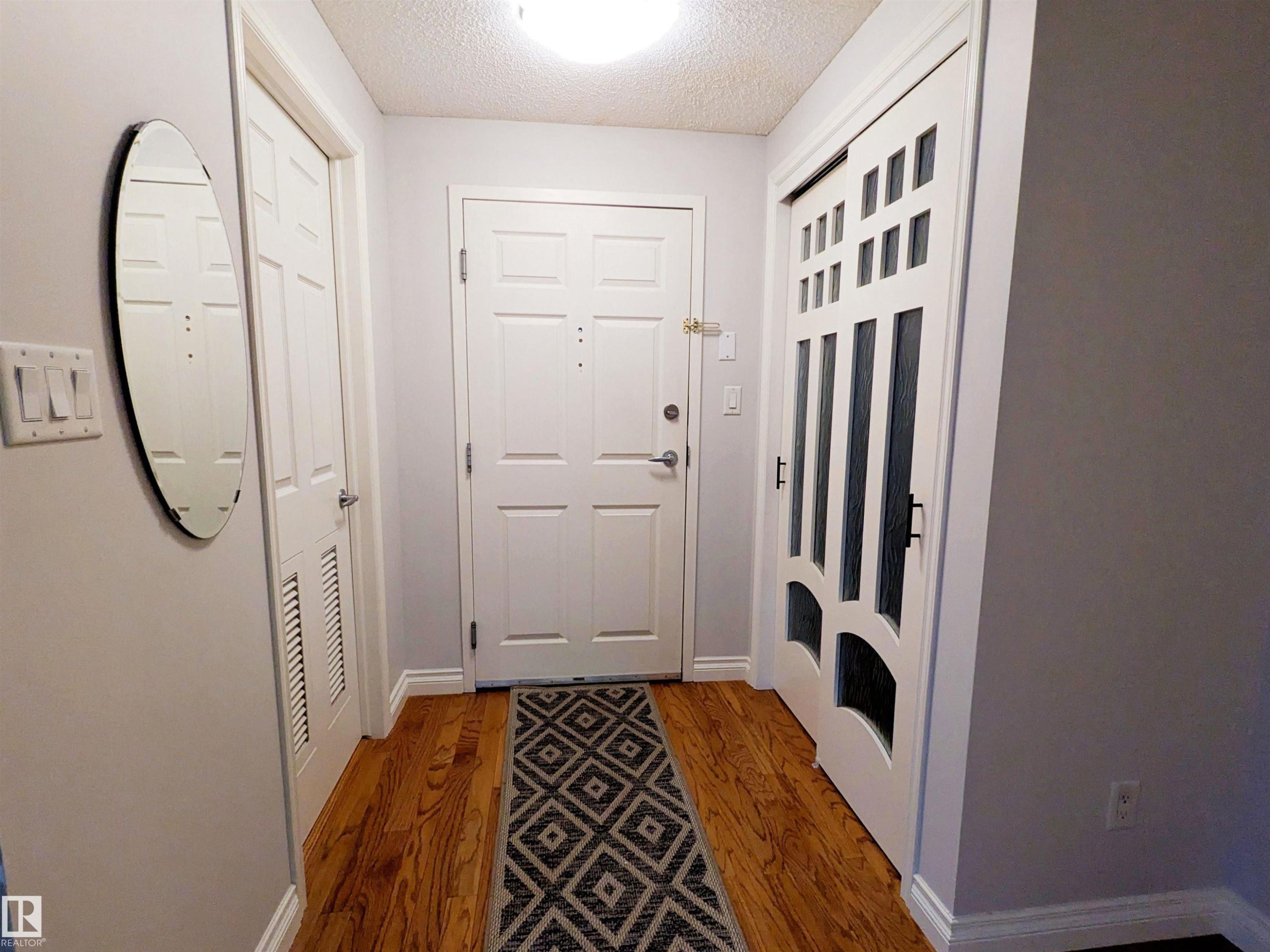 Nice size foyer with a large front closet for storage - #302 9811 96A St Nw, Edmonton, AB - Indoor Photo Showing Other Room