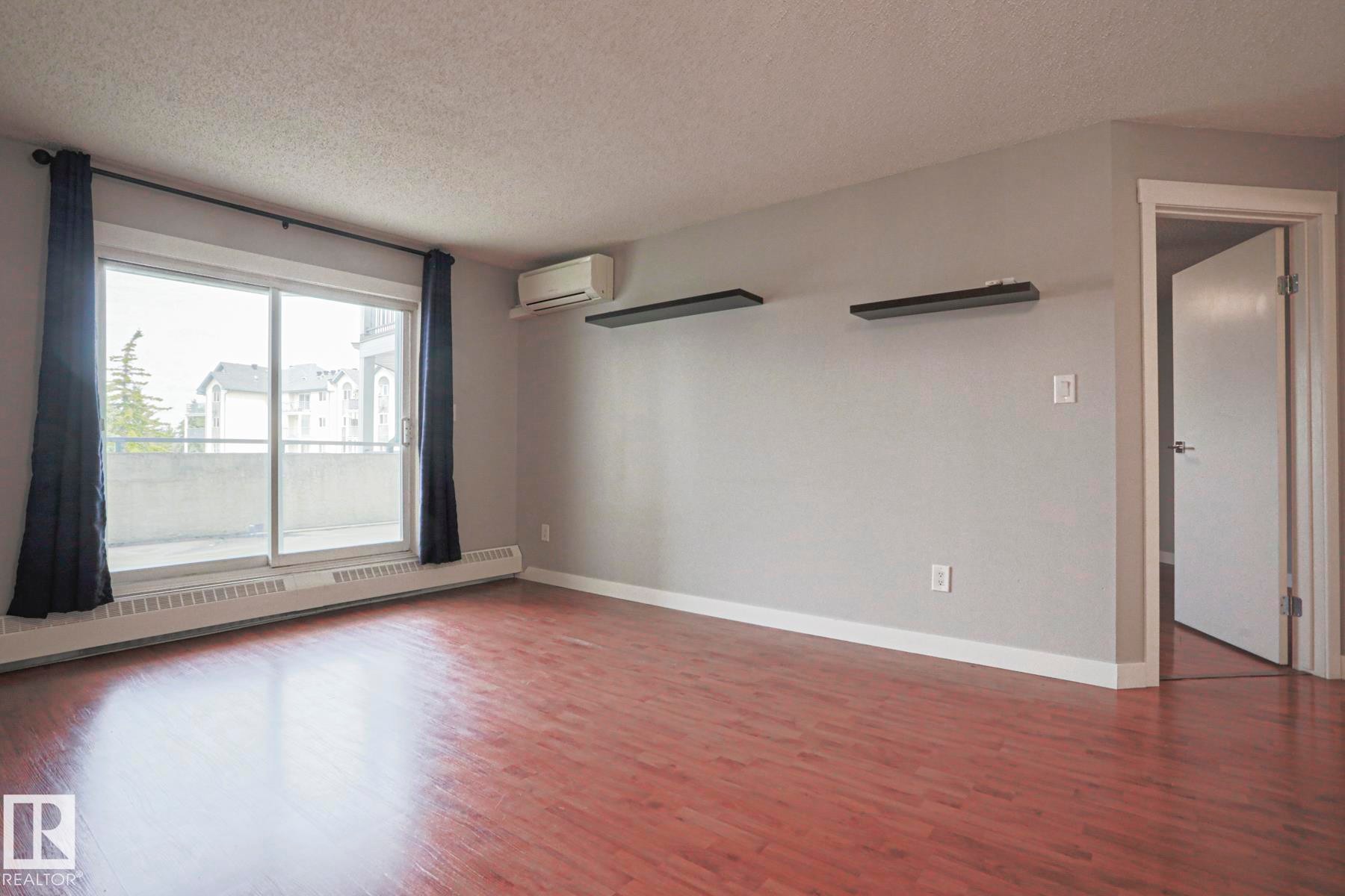 #208 6710 158 Av Nw, Edmonton, AB - Indoor Photo Showing Other Room