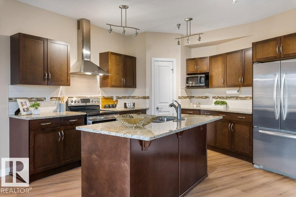 #205 35 Sturgeon Rd, St. Albert, AB - Indoor Photo Showing Kitchen With Double Sink