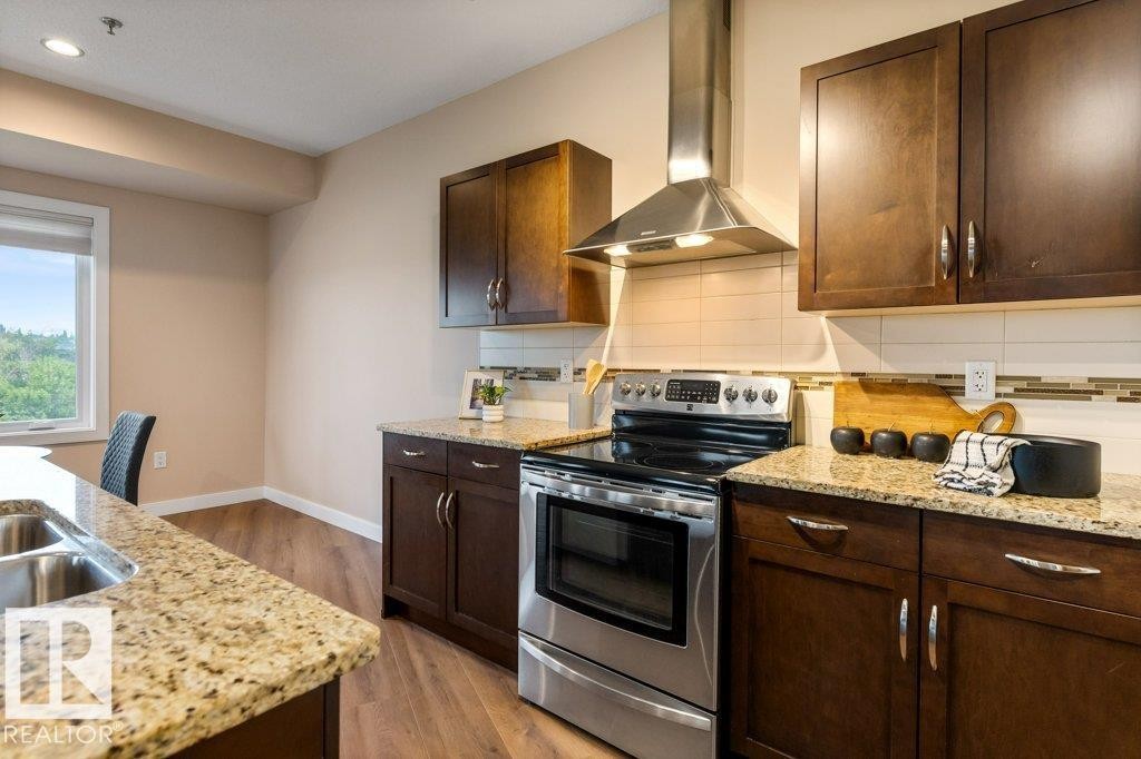 #205 35 Sturgeon Rd, St. Albert, AB - Indoor Photo Showing Kitchen With Double Sink