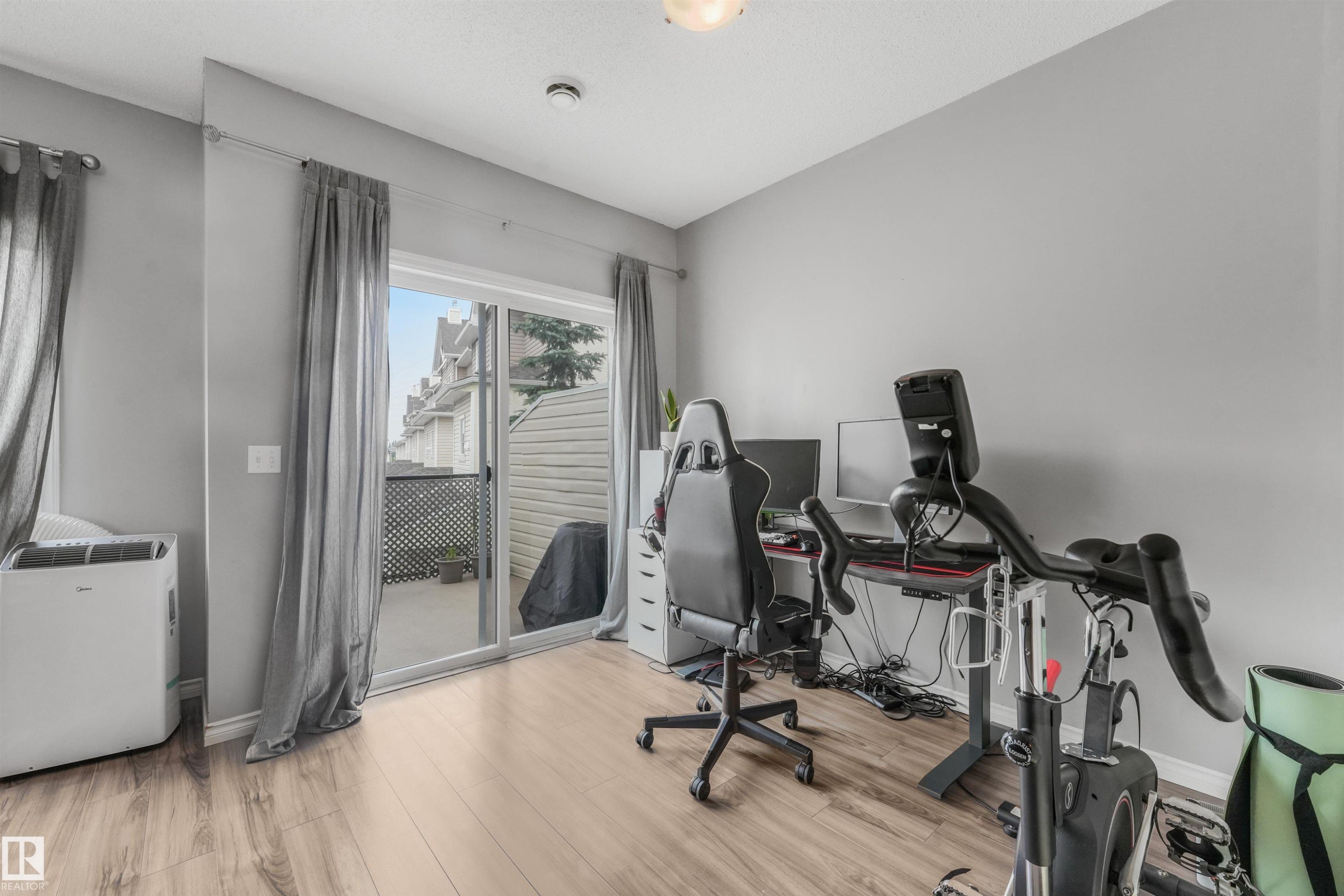 #33 3010 33 Av Nw, Edmonton, AB - Indoor Photo Showing Gym Room