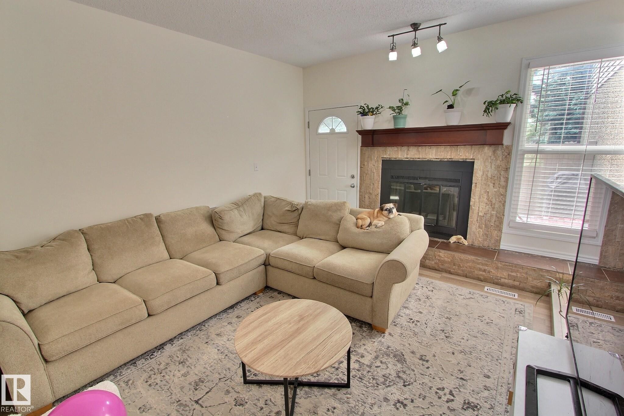 17004 100 Street Nw, Edmonton, AB - Indoor Photo Showing Living Room With Fireplace