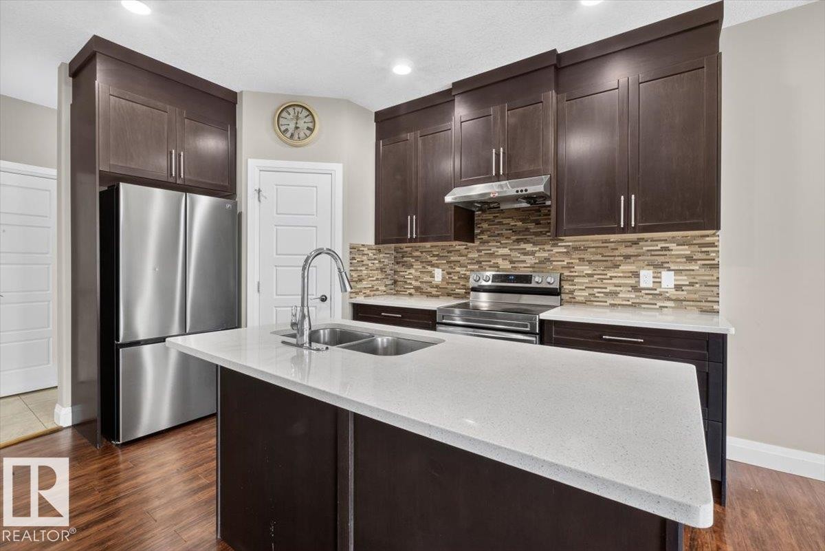 2005 15 Avenue Nw, Edmonton, AB - Indoor Photo Showing Kitchen With Double Sink With Upgraded Kitchen
