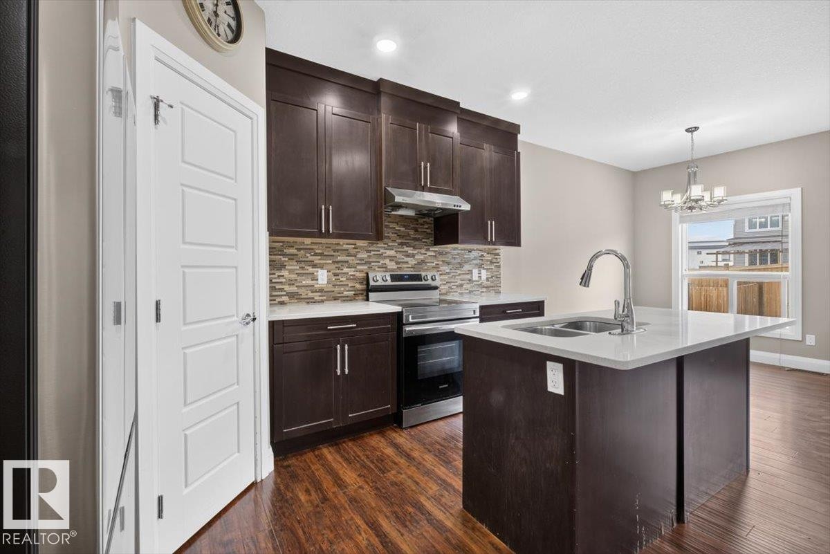 2005 15 Avenue Nw, Edmonton, AB - Indoor Photo Showing Kitchen With Double Sink With Upgraded Kitchen