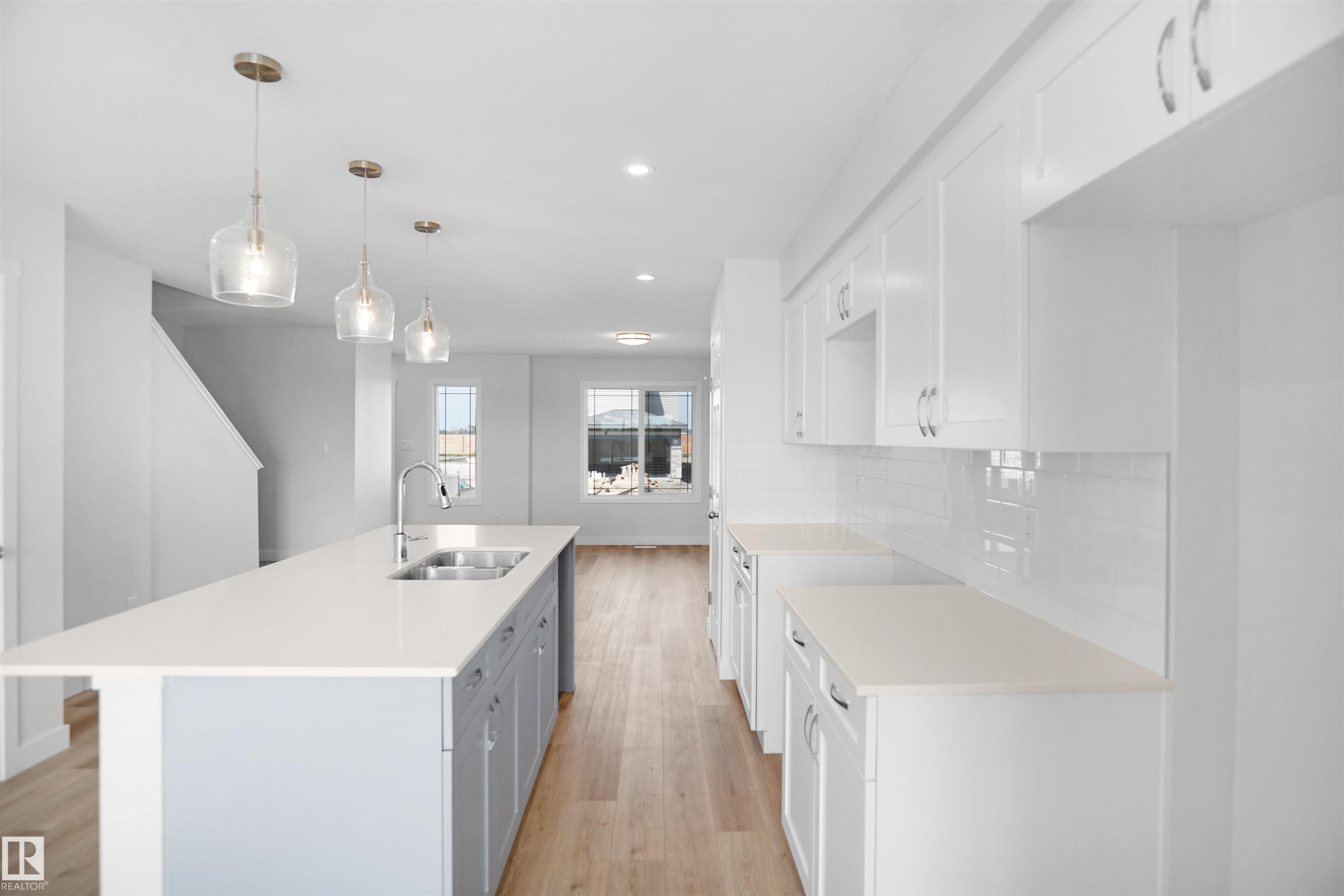 106 Juniper Wynd, Fort Saskatchewan, AB - Indoor Photo Showing Kitchen With Double Sink With Upgraded Kitchen