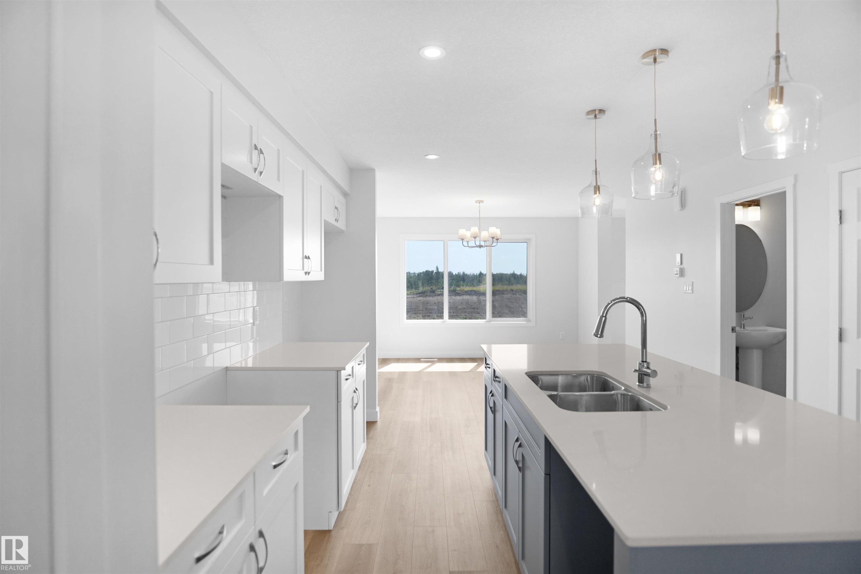 106 Juniper Wynd, Fort Saskatchewan, AB - Indoor Photo Showing Kitchen With Double Sink With Upgraded Kitchen