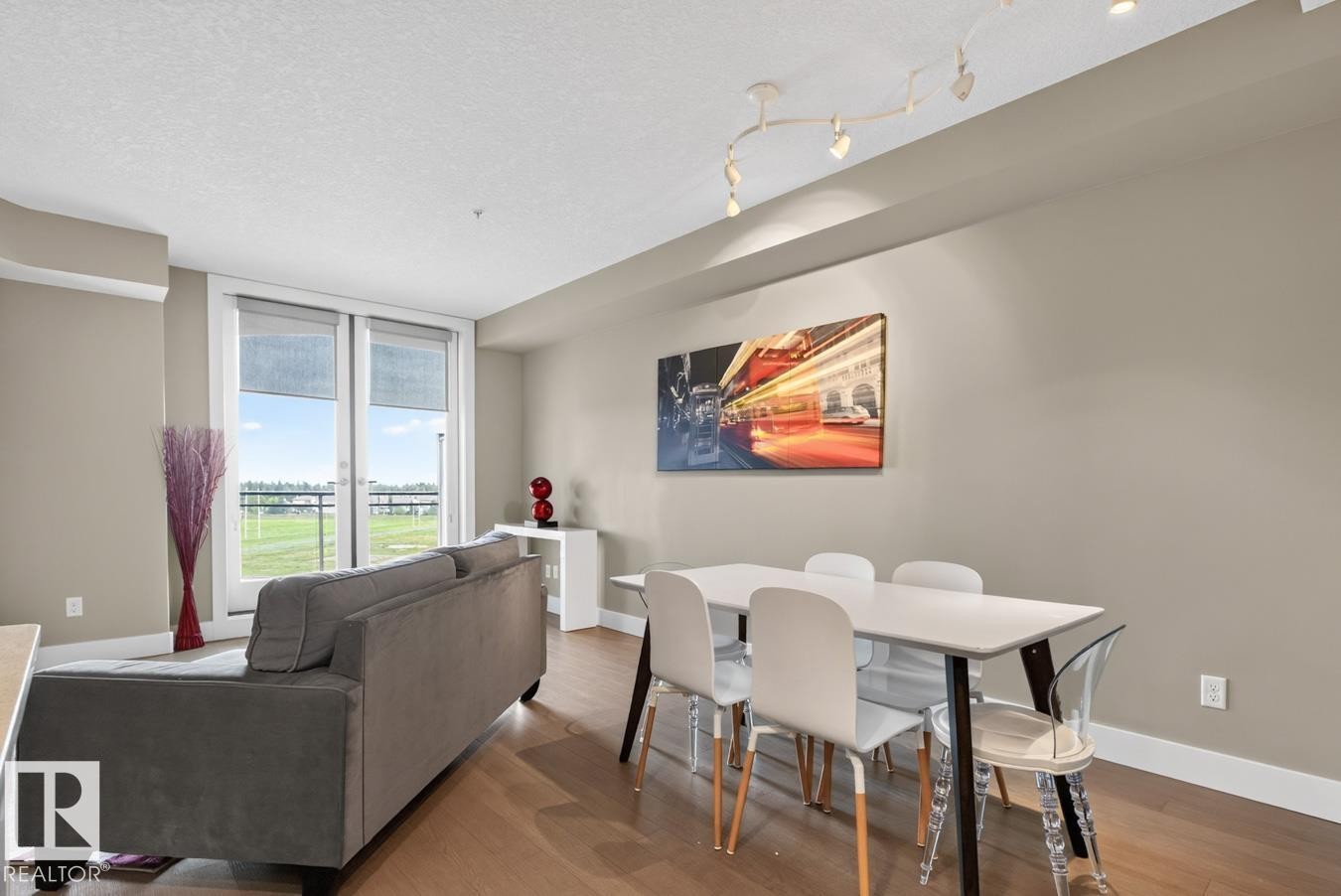#510 11080 Ellerslie Rd Sw, Edmonton, AB - Indoor Photo Showing Living Room With Fireplace