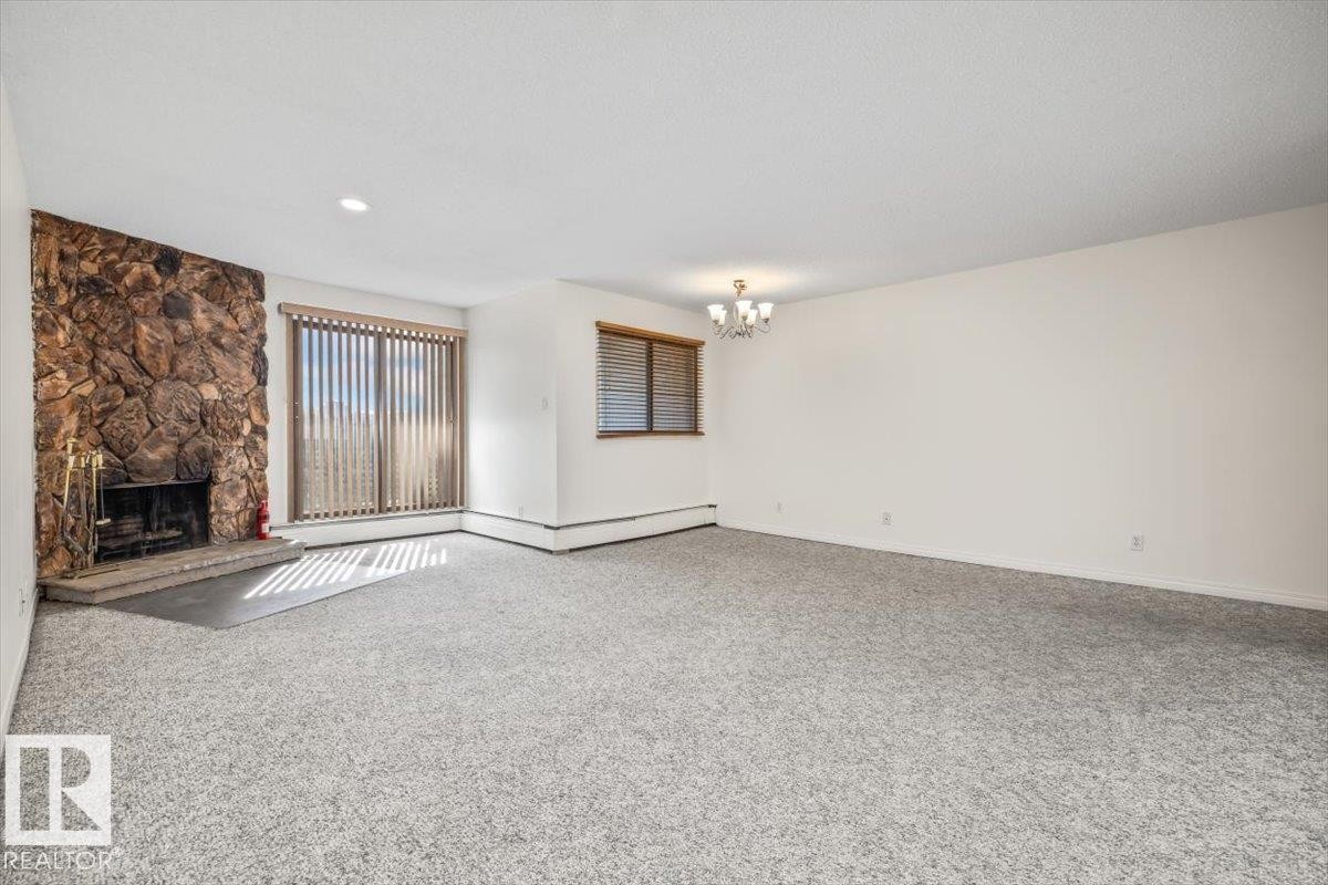 #206 10148 118 St Nw, Edmonton, AB - Indoor With Fireplace