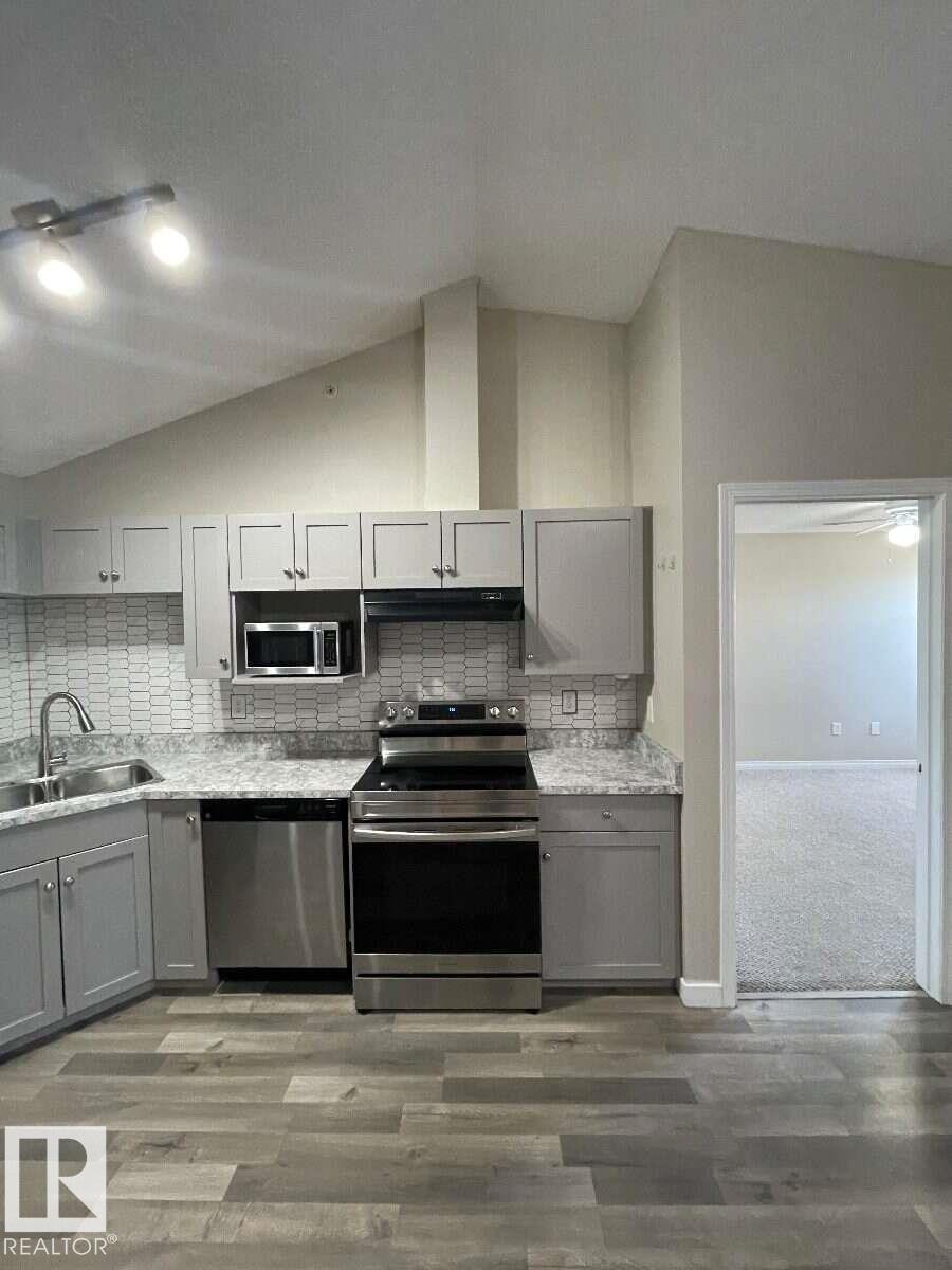 #405 151 Edwards Dr Sw, Edmonton, AB - Indoor Photo Showing Kitchen With Upgraded Kitchen