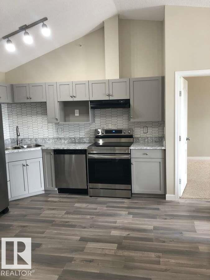 #405 151 Edwards Dr Sw, Edmonton, AB - Indoor Photo Showing Kitchen With Upgraded Kitchen