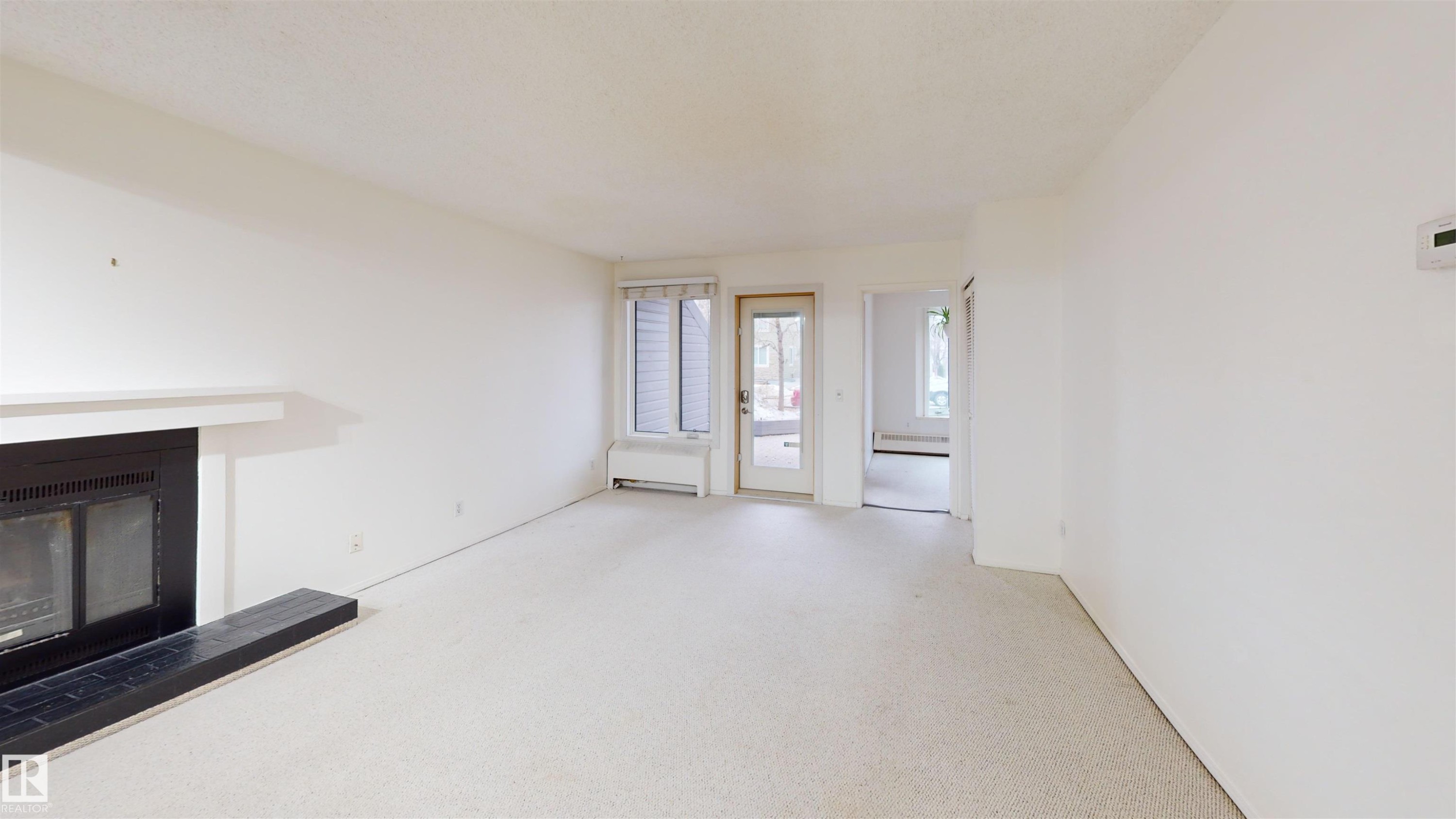 #109 11115 80 Av Nw, Edmonton, AB - Indoor With Fireplace