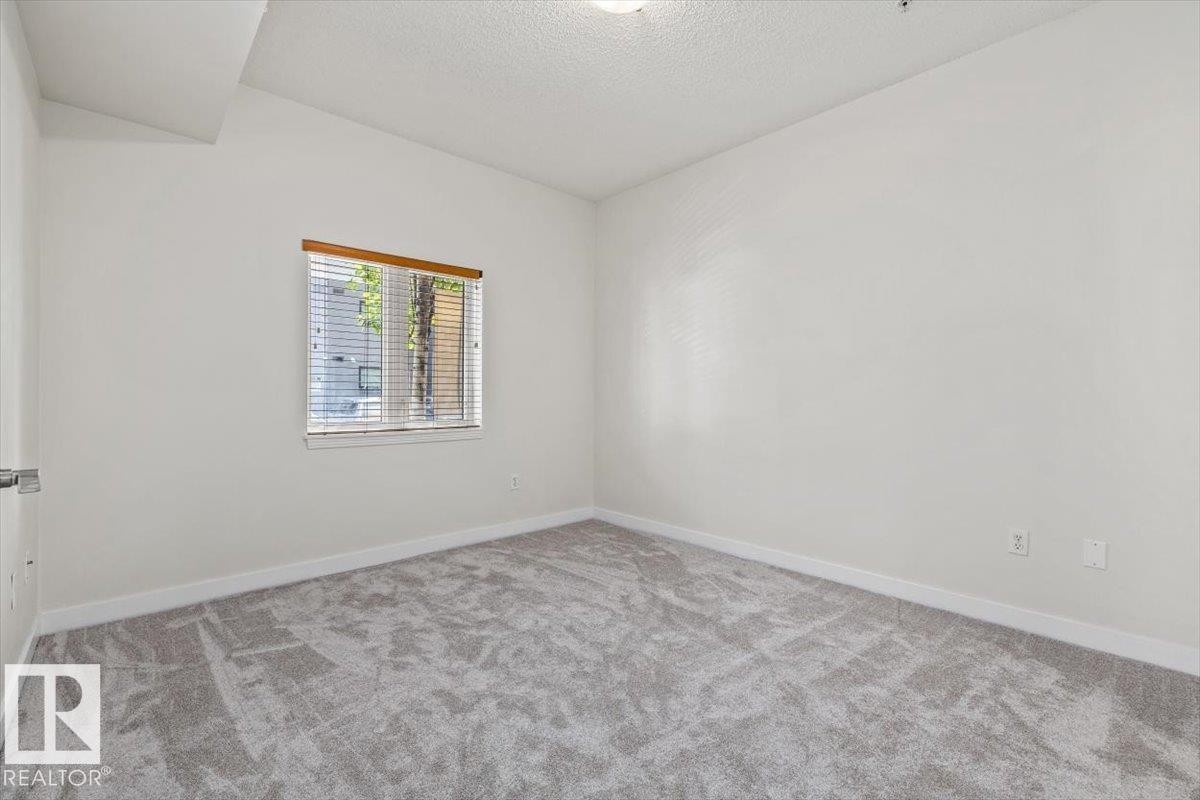 #118 10333 112 St Nw, Edmonton, AB - Indoor Photo Showing Other Room