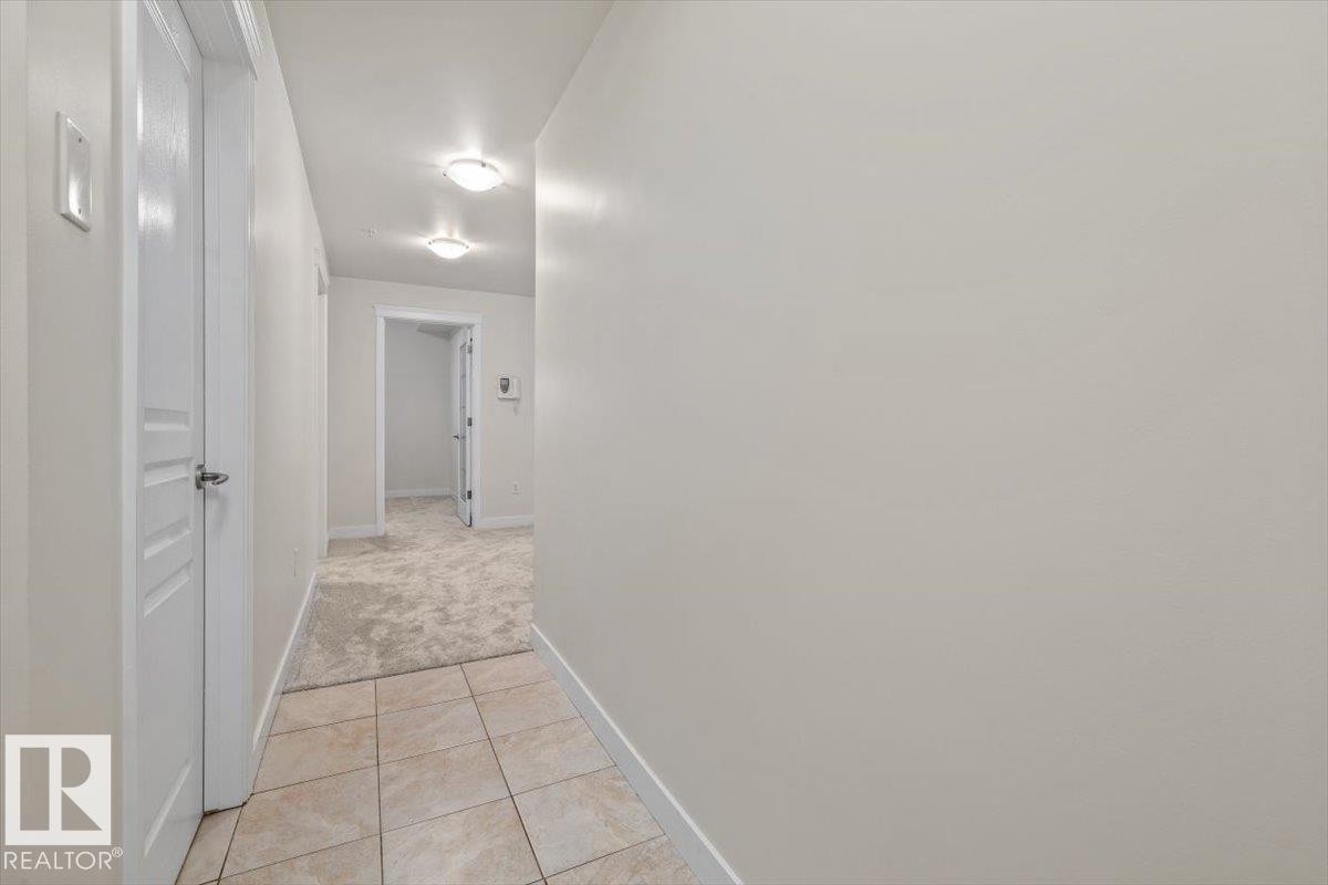 #118 10333 112 St Nw, Edmonton, AB - Indoor Photo Showing Other Room