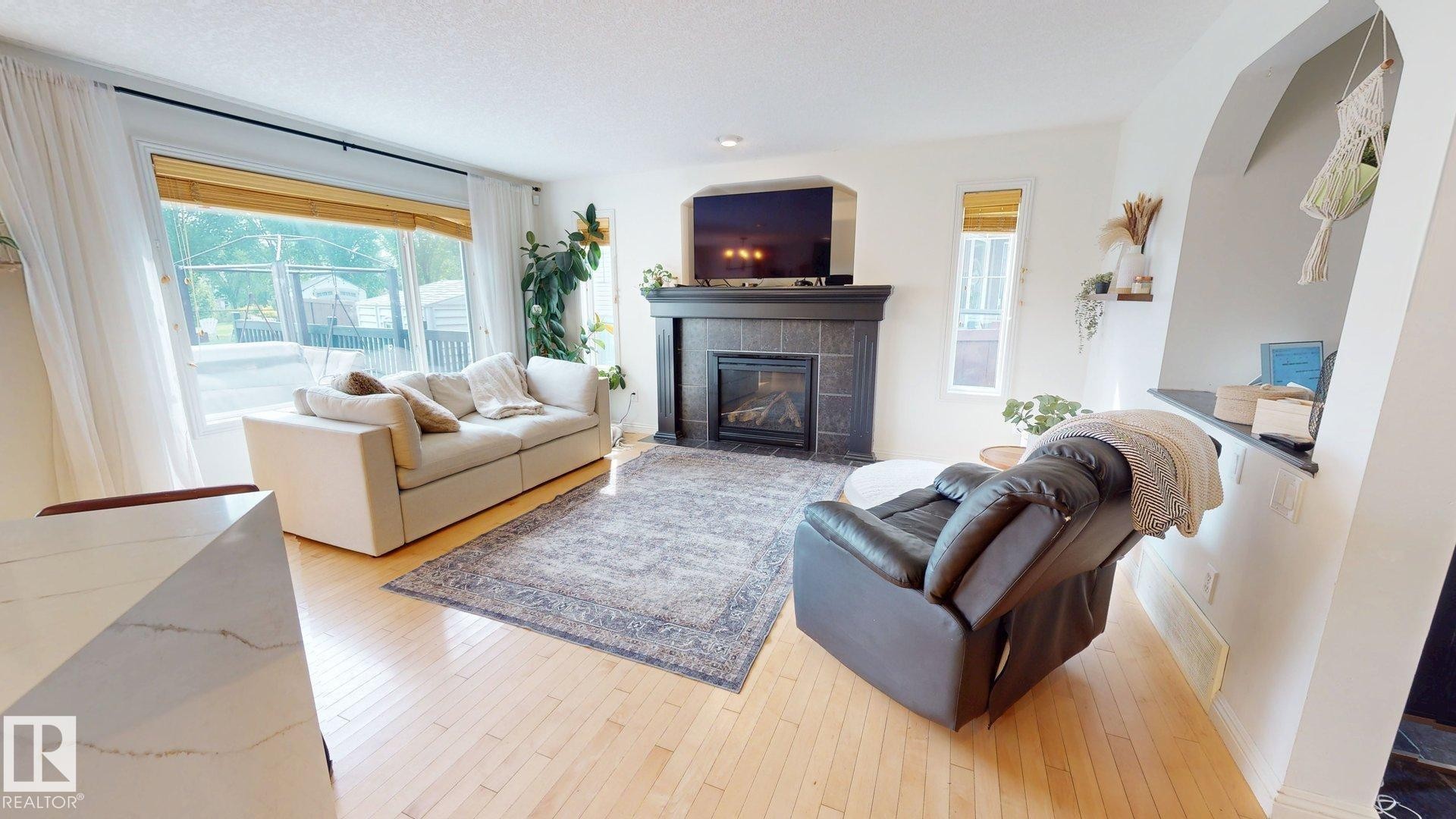 1303 117St Sw, Edmonton, AB - Indoor Photo Showing Living Room With Fireplace