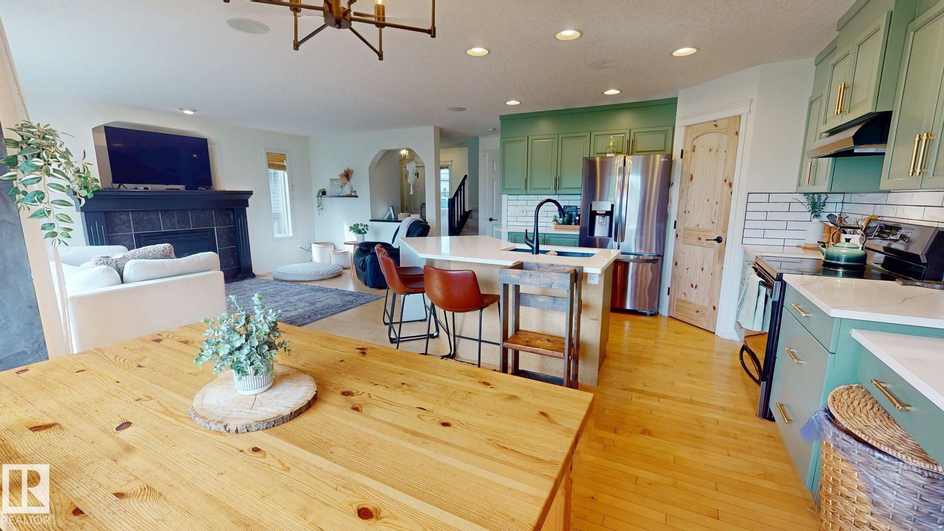 1303 117St Sw, Edmonton, AB - Indoor Photo Showing Kitchen With Fireplace With Upgraded Kitchen