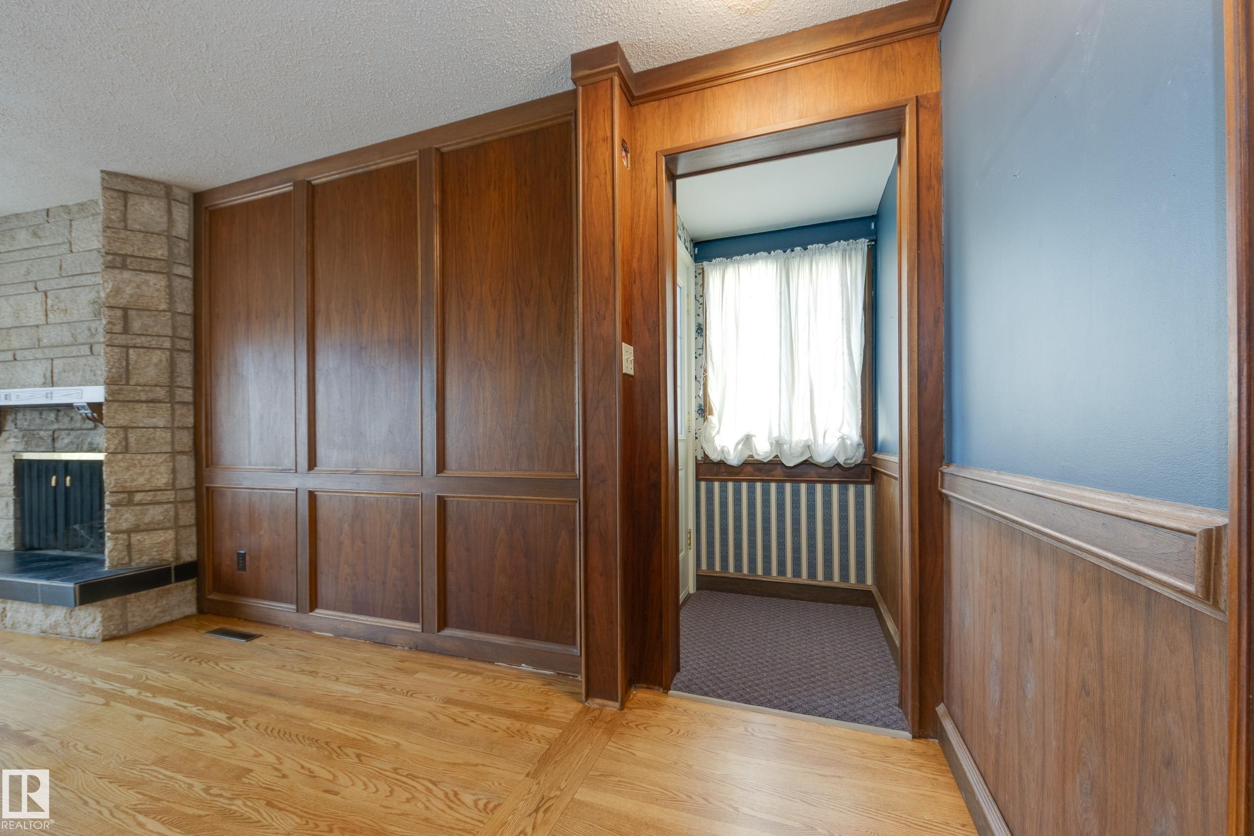 4716 109 Avenue Nw, Edmonton, AB - Indoor Photo Showing Other Room With Fireplace
