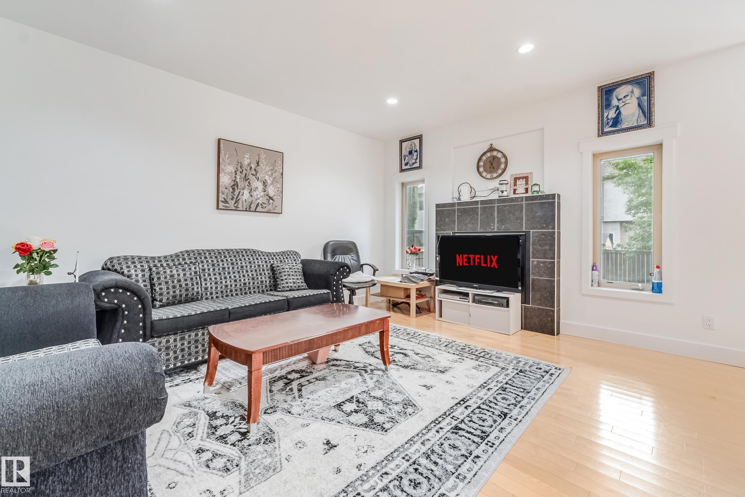 1508 68 Street Sw, Edmonton, AB - Indoor Photo Showing Living Room With Fireplace
