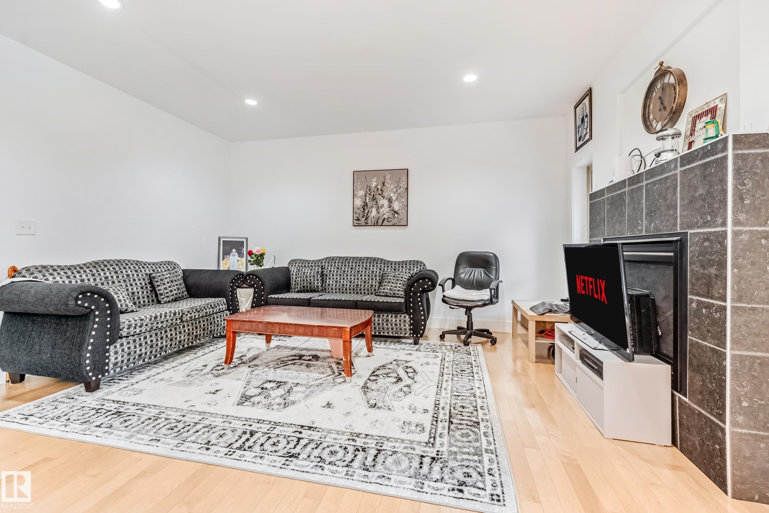 1508 68 Street Sw, Edmonton, AB - Indoor Photo Showing Living Room With Fireplace