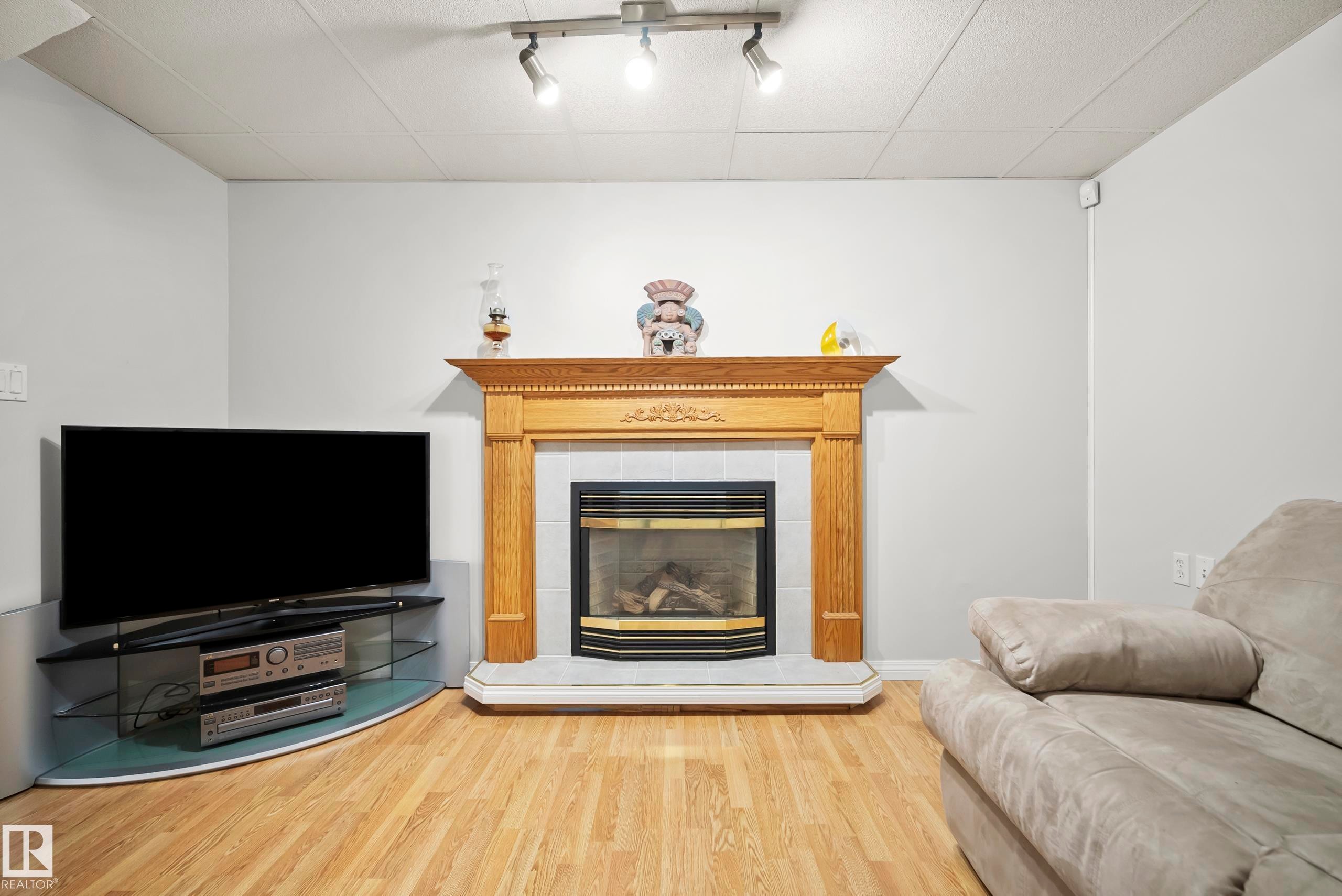 17312 105 Street Nw, Edmonton, AB - Indoor Photo Showing Living Room With Fireplace