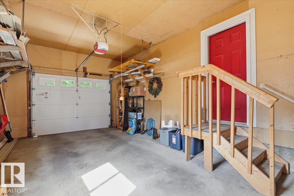 128 Green Ash Drive, Wetaskiwin, AB - Indoor Photo Showing Garage