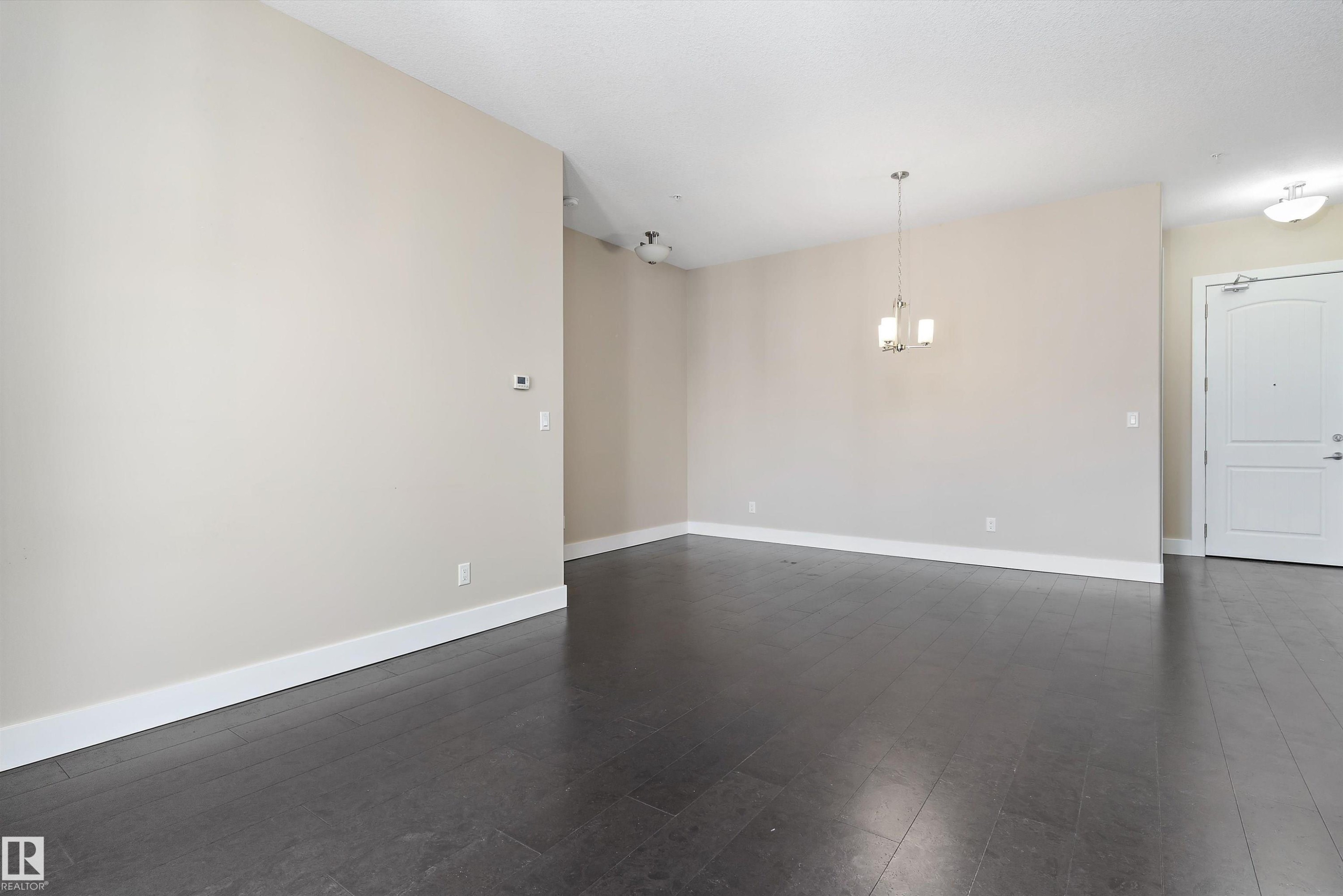 #449 6079 Maynard Wy Nw, Edmonton, AB - Indoor Photo Showing Other Room