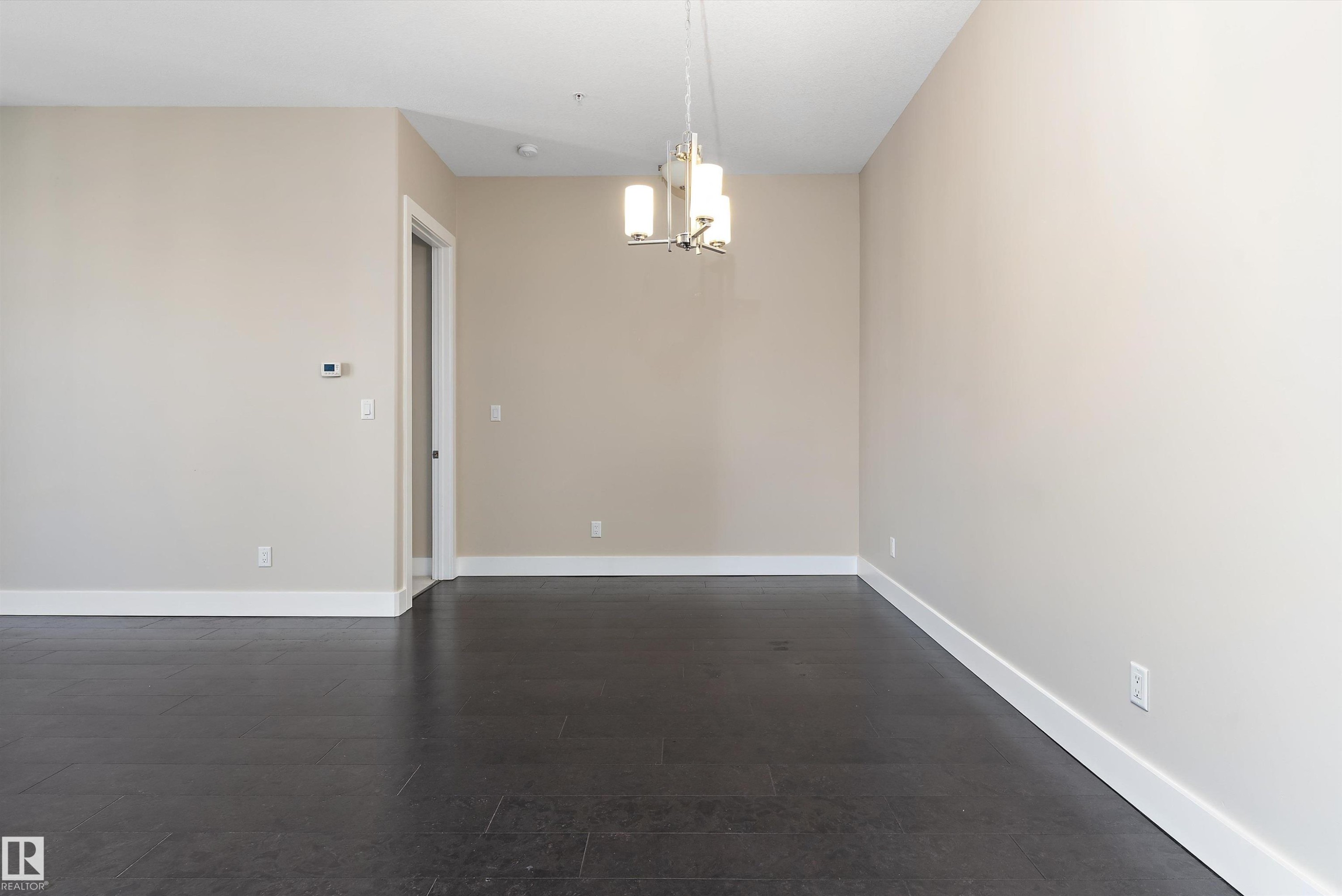 #449 6079 Maynard Wy Nw, Edmonton, AB - Indoor Photo Showing Other Room